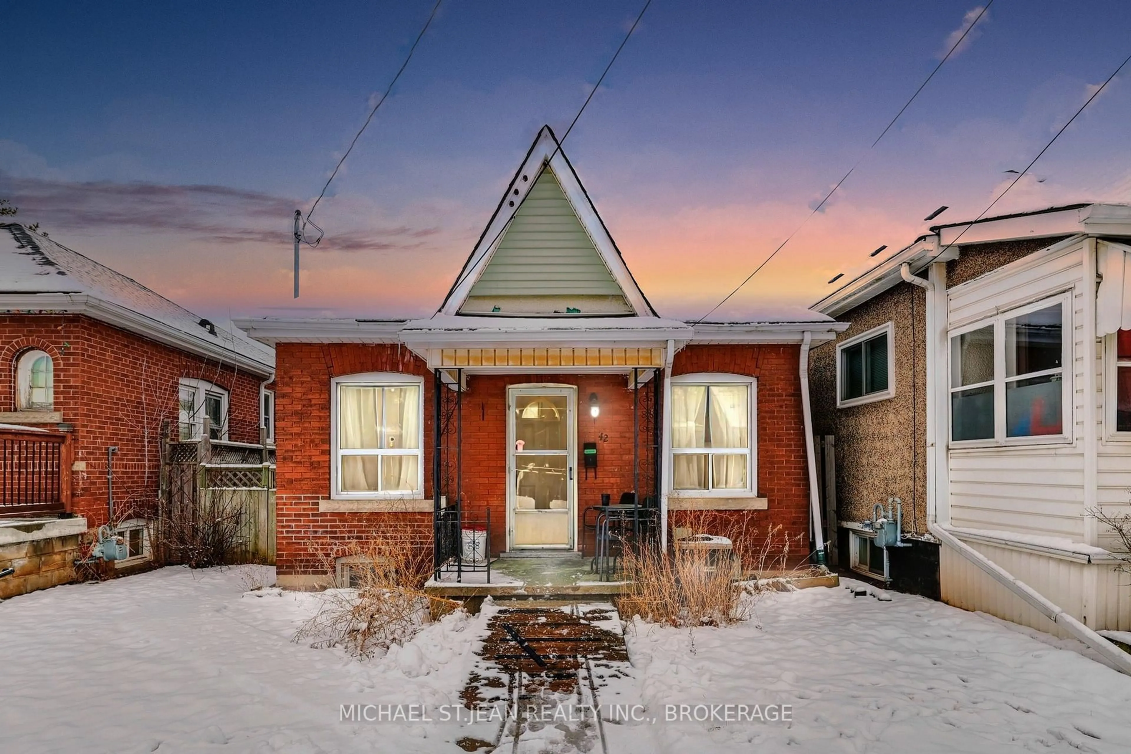 Home with brick exterior material, street for 42 Ellis Ave, Hamilton Ontario L8H 4L7