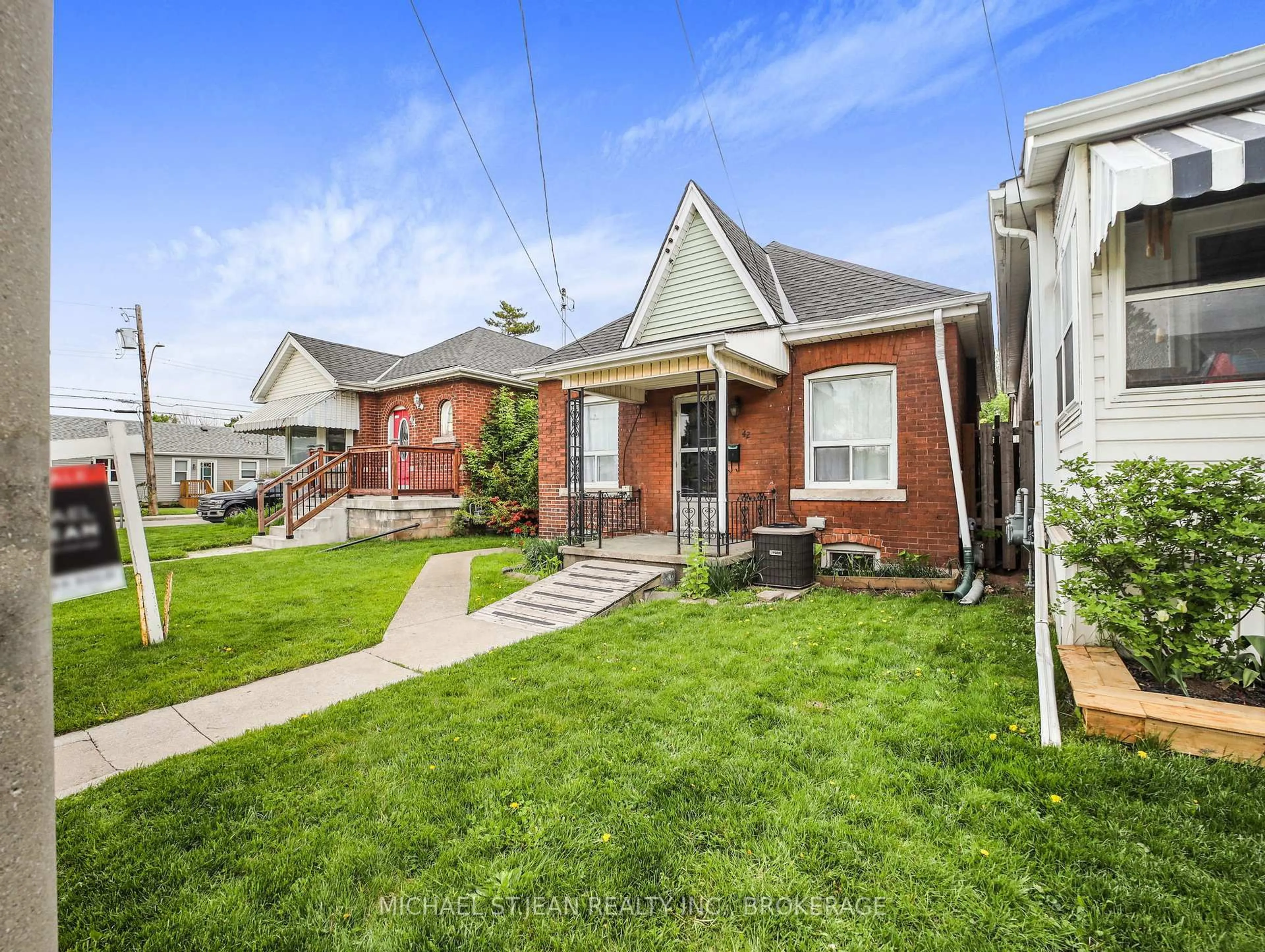 Home with brick exterior material, street for 42 Ellis Ave, Hamilton Ontario L8H 4L7