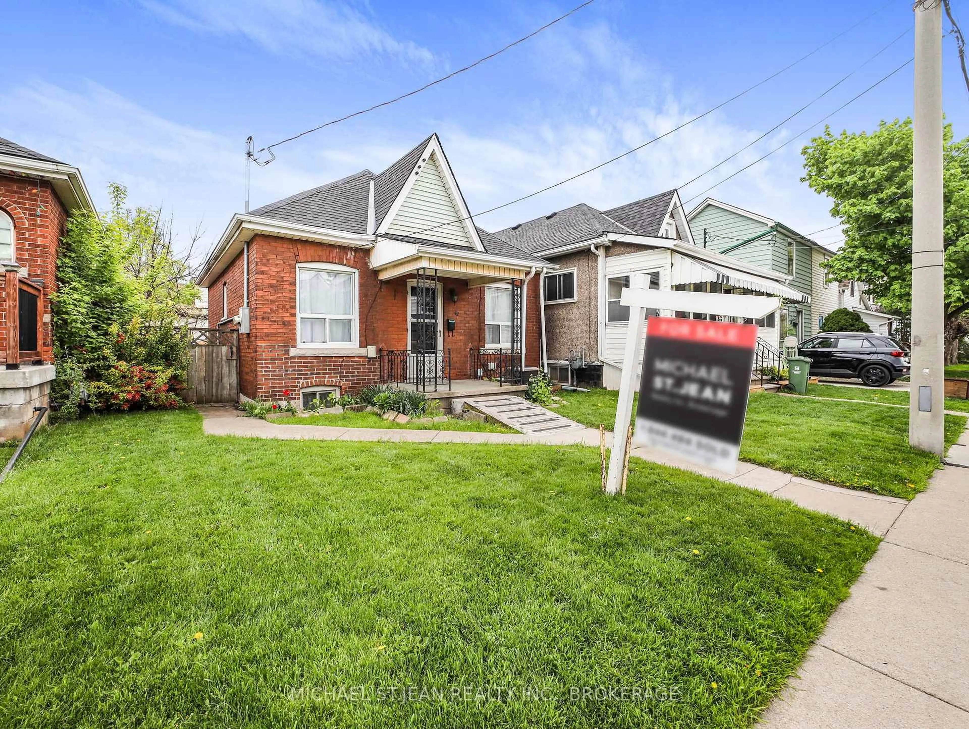 Home with brick exterior material, street for 42 Ellis Ave, Hamilton Ontario L8H 4L7
