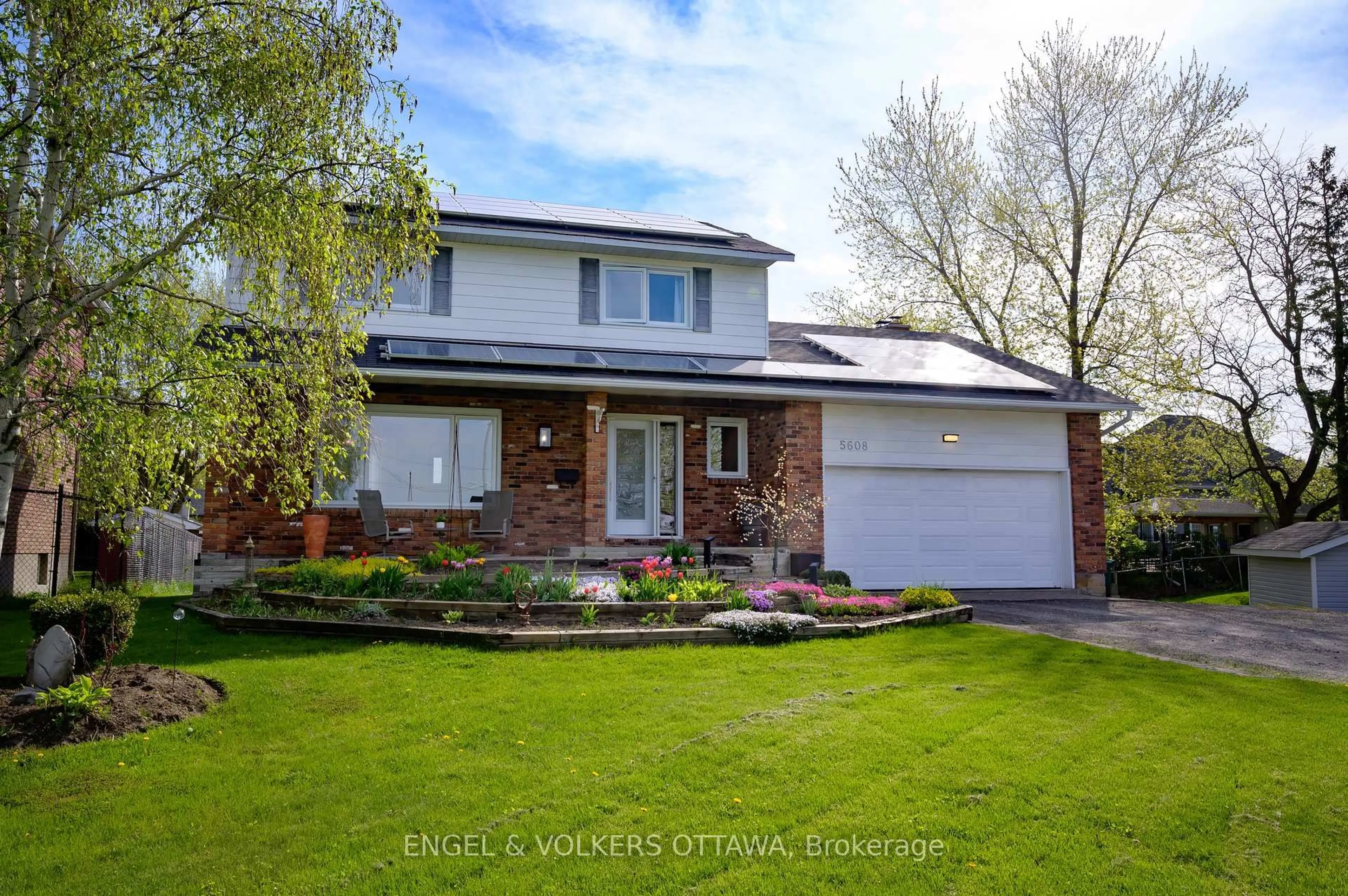 Home with brick exterior material, street for 5608 Richmond Rd, Ottawa Ontario K2R 1E3