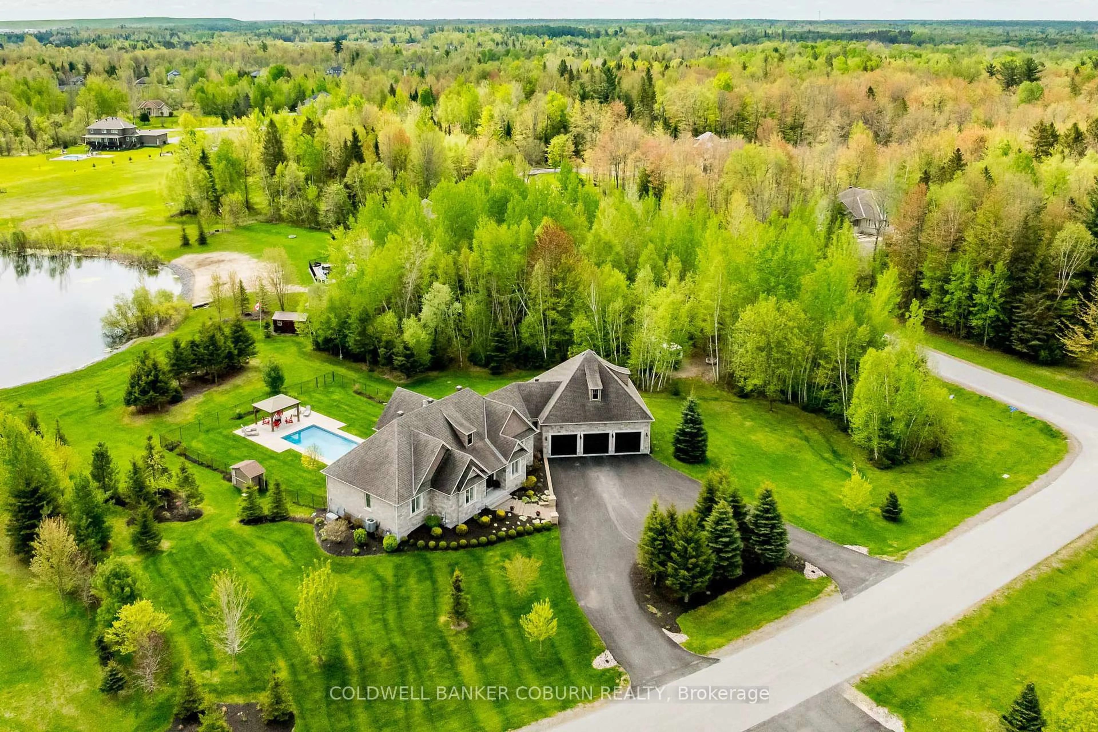 A pic from outside/outdoor area/front of a property/back of a property/a pic from drone, unknown for 155 West Lake Circ, Carp Ontario K0A 1L0
