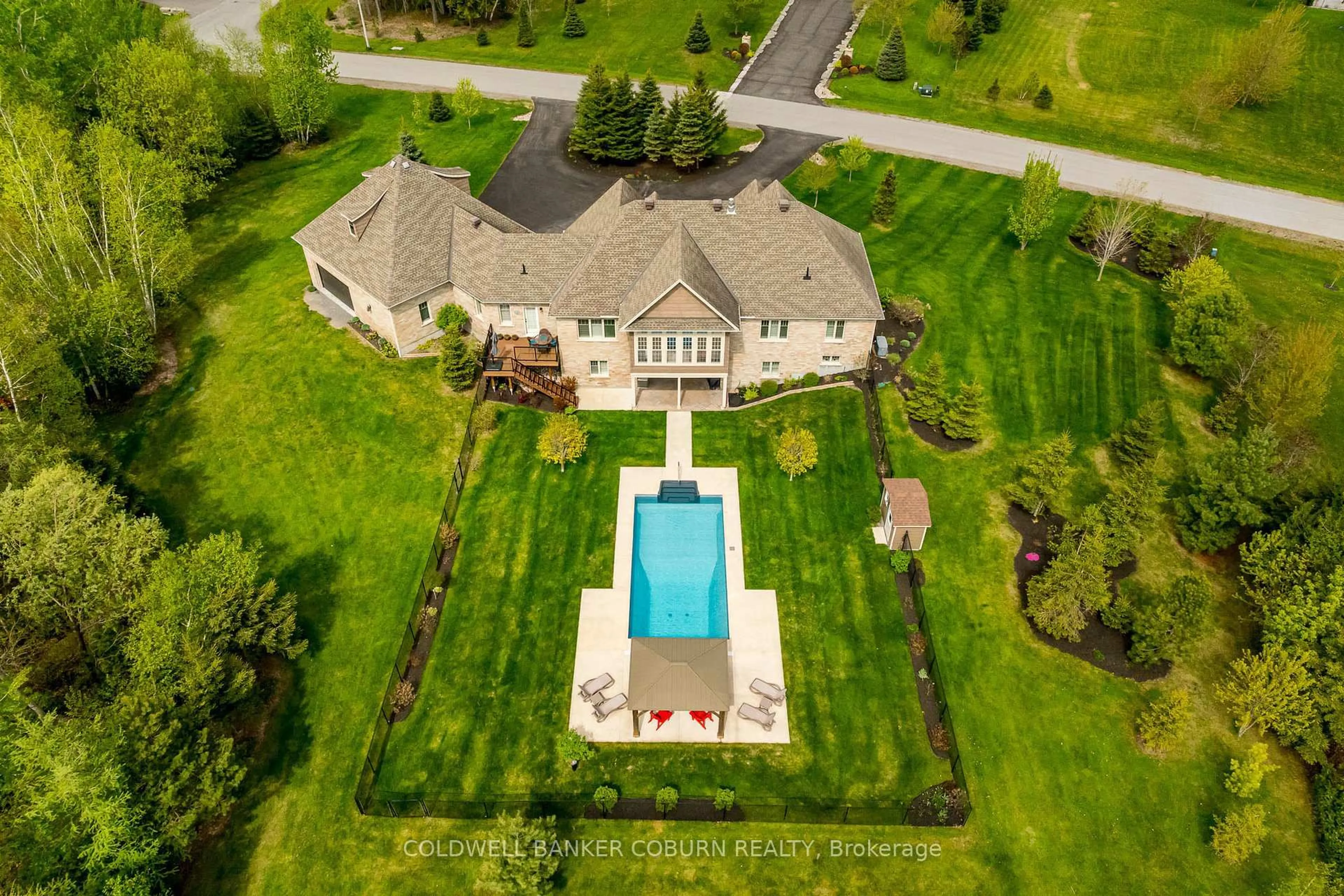 A pic from outside/outdoor area/front of a property/back of a property/a pic from drone, unknown for 155 West Lake Circ, Carp Ontario K0A 1L0
