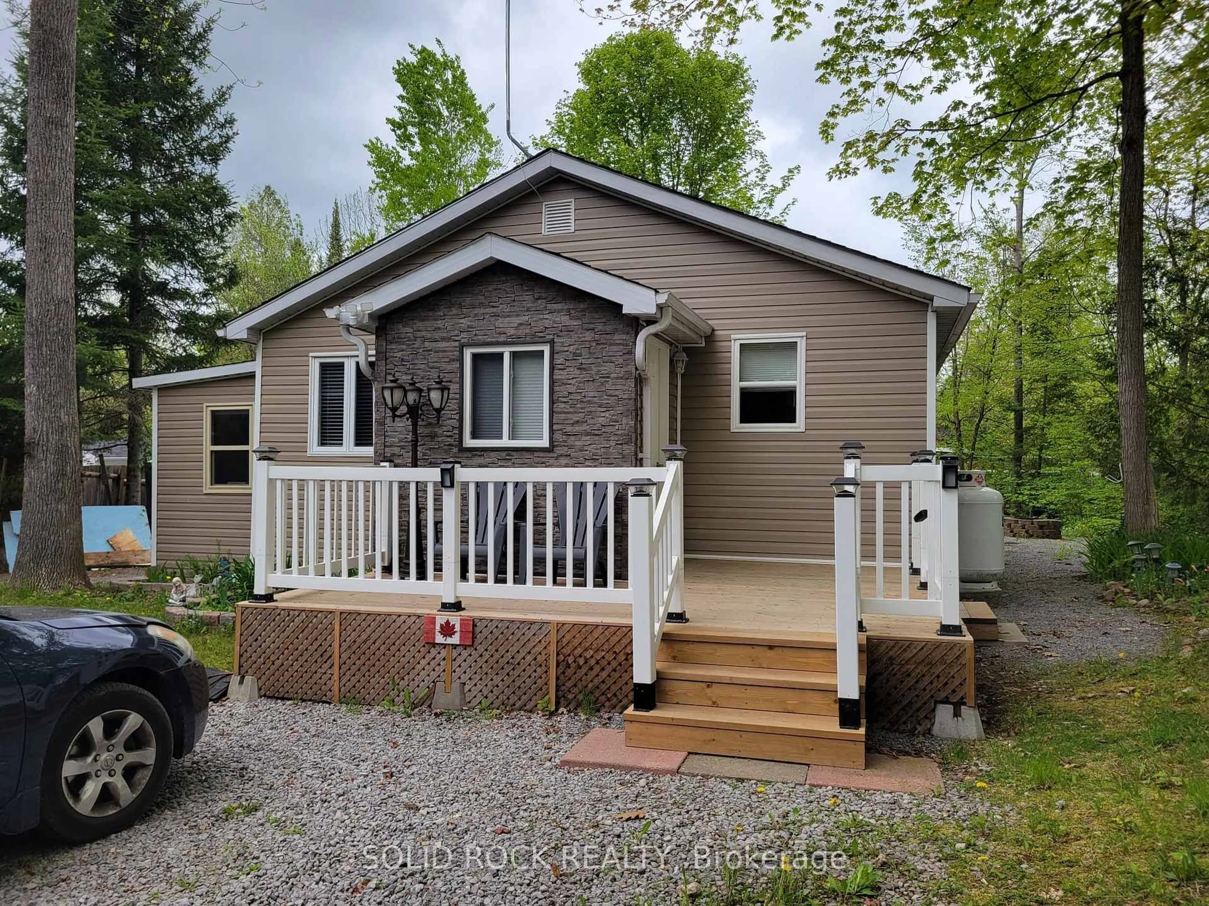 Home with vinyl exterior material, street for 74 Cedar Lane, Trent Hills Ontario K0L 1L0