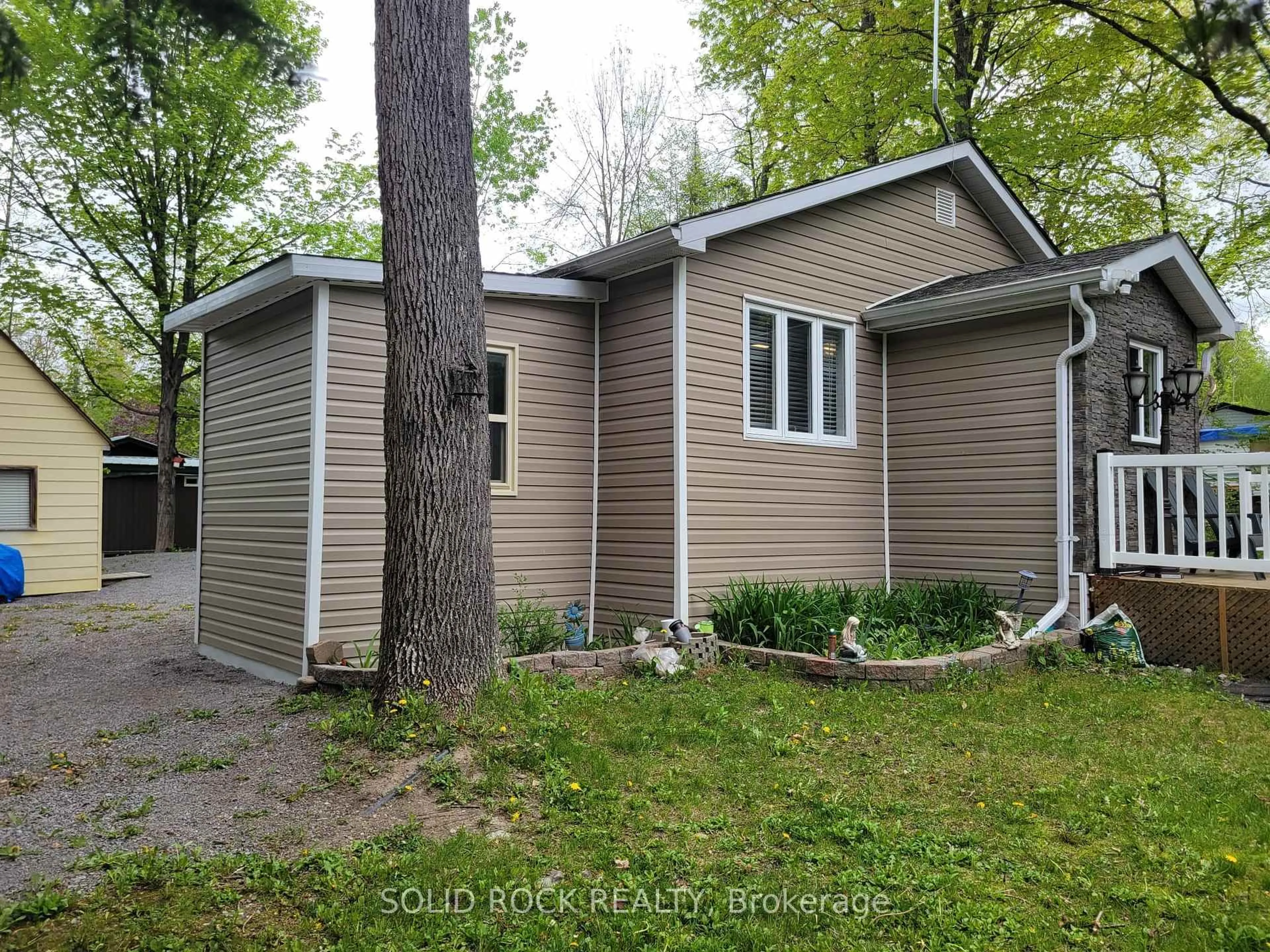 Home with vinyl exterior material, street for 74 Cedar Lane, Trent Hills Ontario K0L 1L0