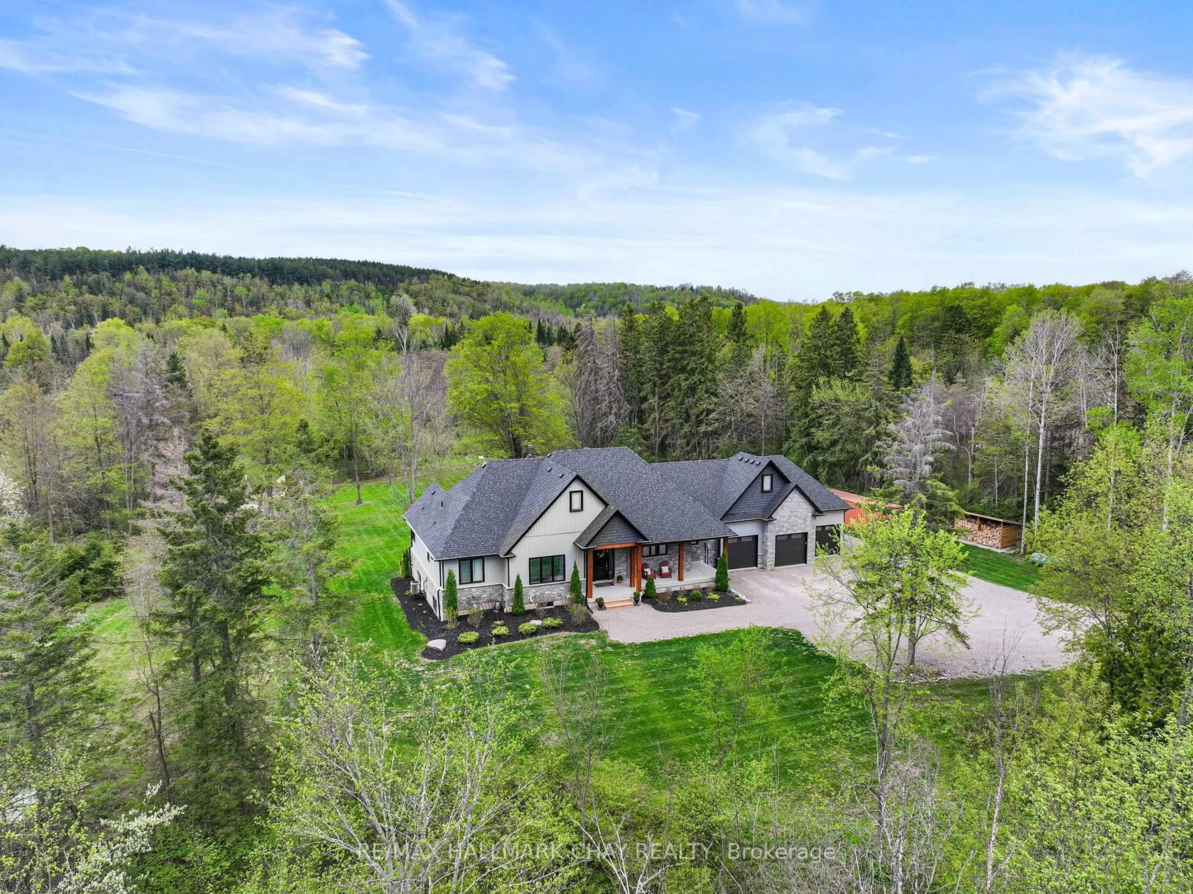 A pic from outside/outdoor area/front of a property/back of a property/a pic from drone, unknown for 667256 20th Sdrd, Mulmur Ontario L9V 0V6