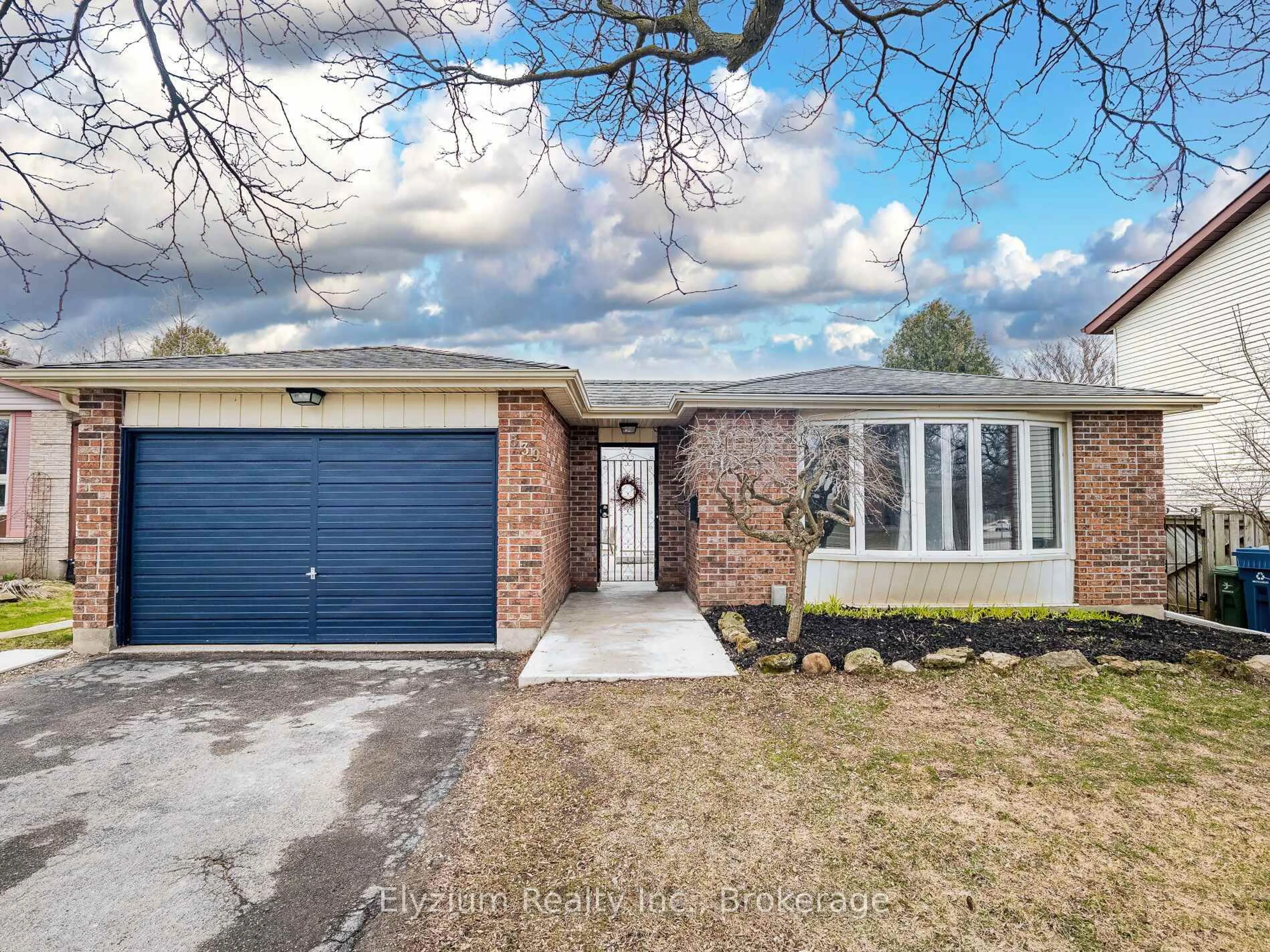 Home with brick exterior material, street for 539 Kortright Rd, Guelph Ontario N1G 3J6