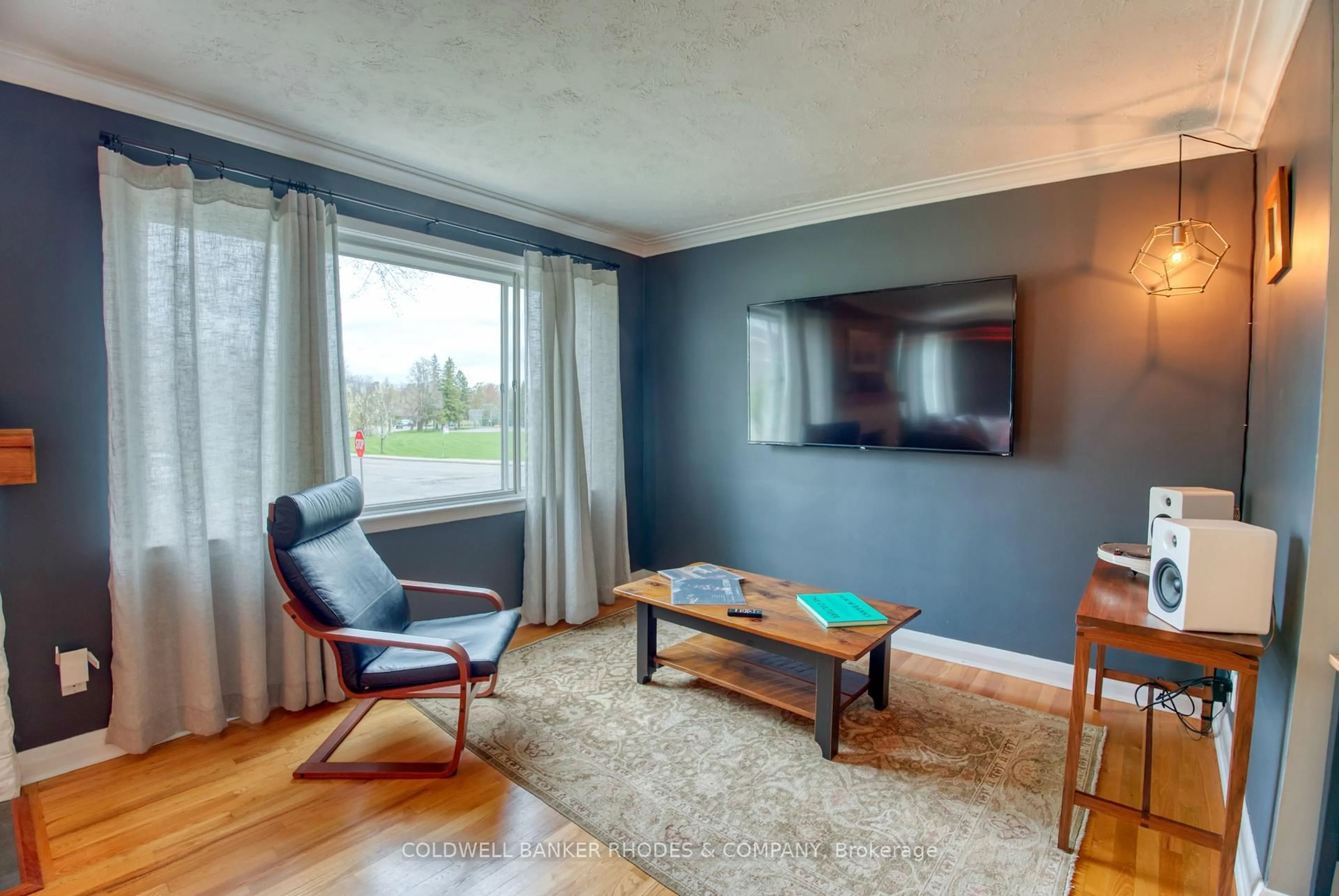 Living room with furniture, wood/laminate floor for 2066 Black Friars Rd, Ottawa Ontario K2A 3K5