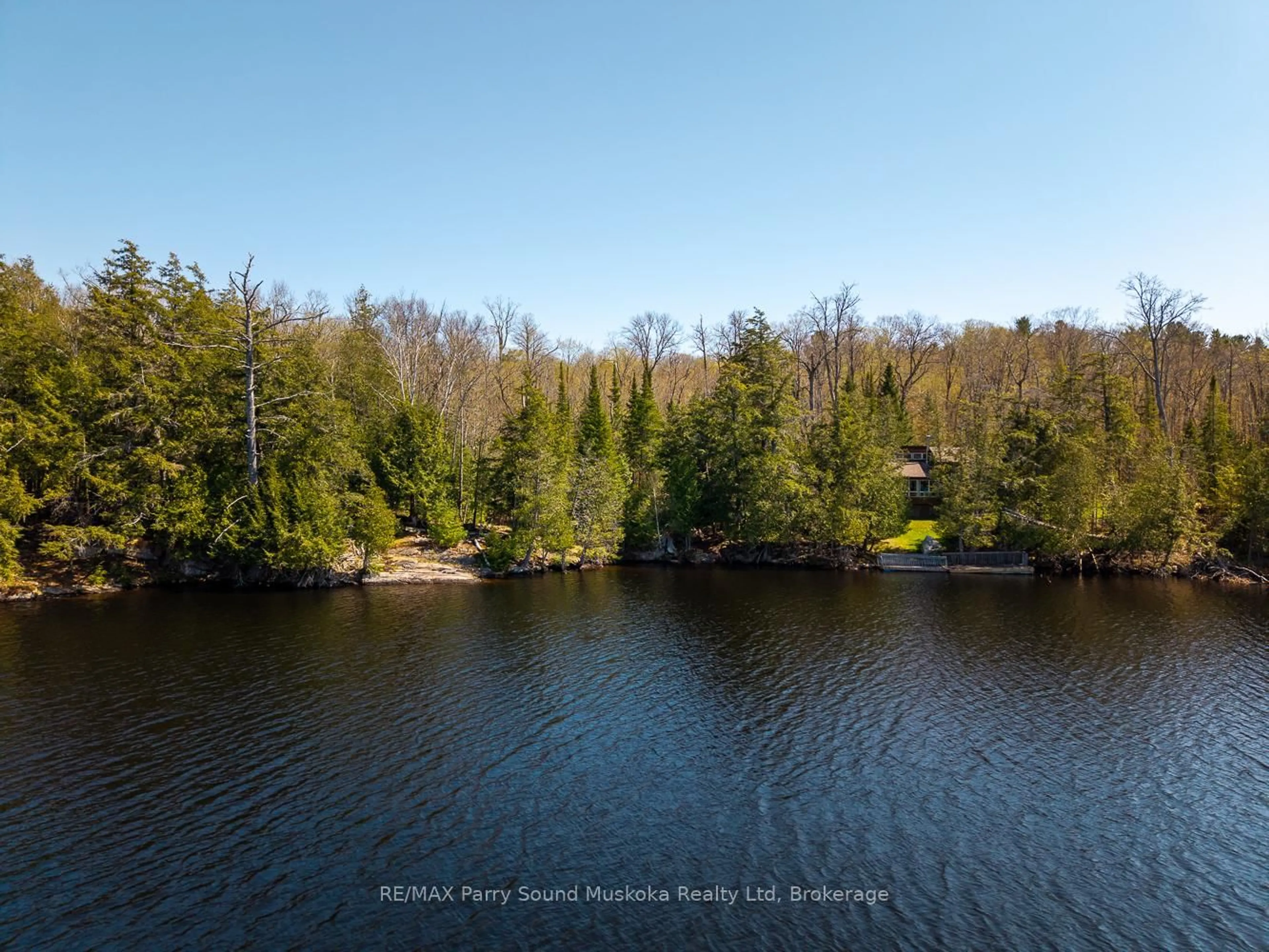 A pic from outside/outdoor area/front of a property/back of a property/a pic from drone, water/lake/river/ocean view for 23 & 25 Dancy Lane, McKellar Ontario P2A 0B5