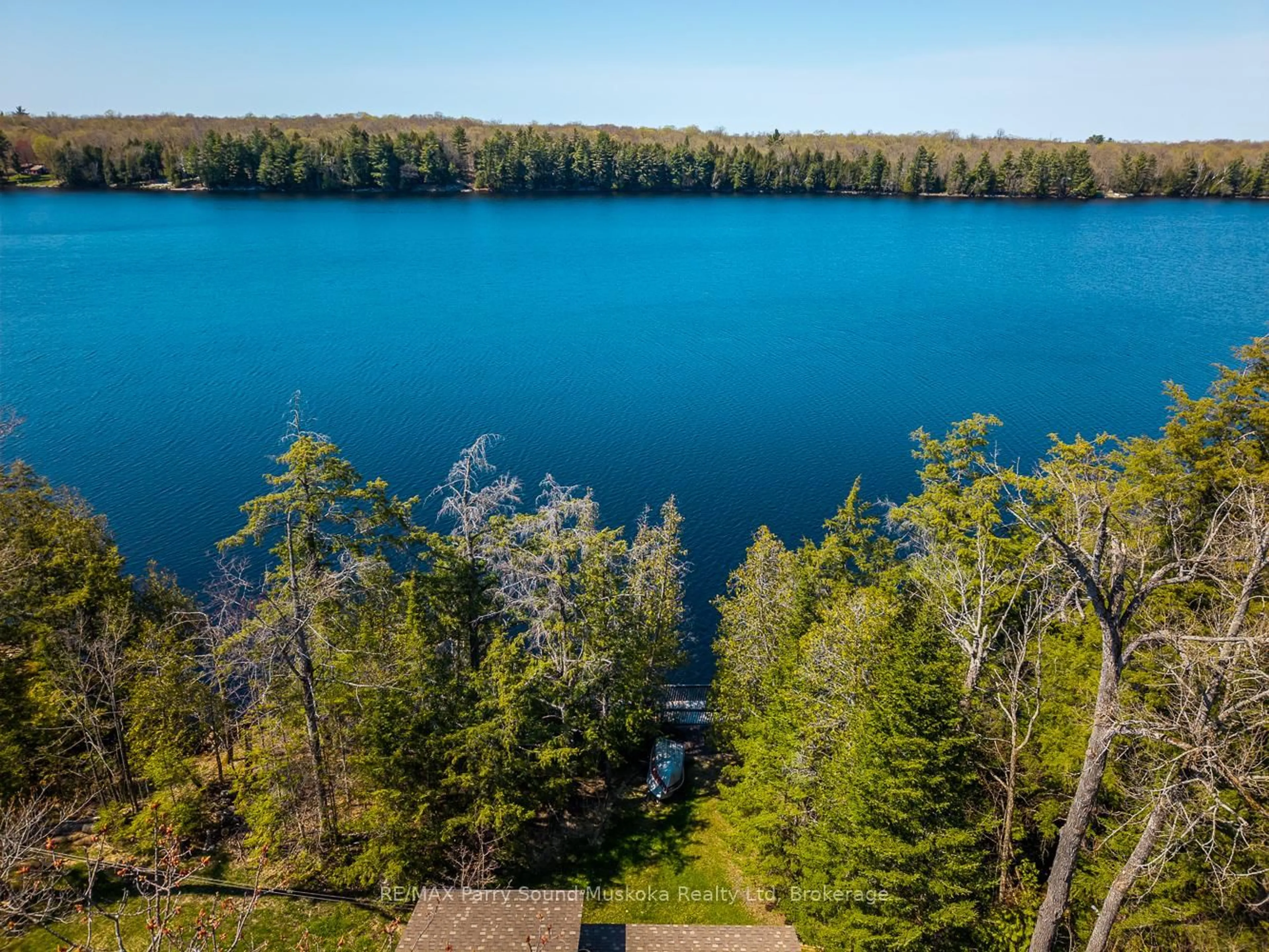A pic from outside/outdoor area/front of a property/back of a property/a pic from drone, water/lake/river/ocean view for 23 & 25 Dancy Lane, McKellar Ontario P2A 0B5