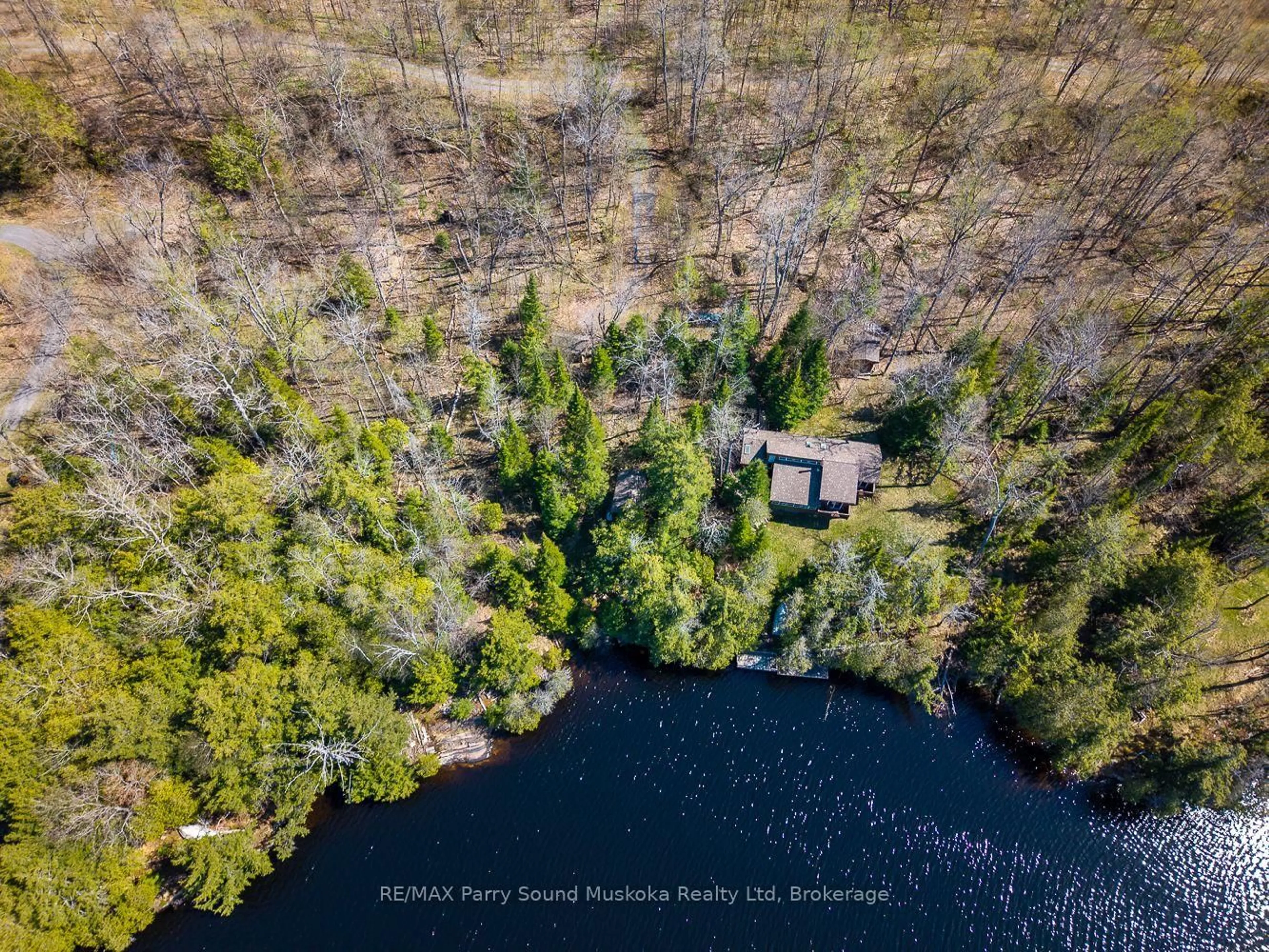A pic from outside/outdoor area/front of a property/back of a property/a pic from drone, water/lake/river/ocean view for 23 & 25 Dancy Lane, McKellar Ontario P2A 0B5