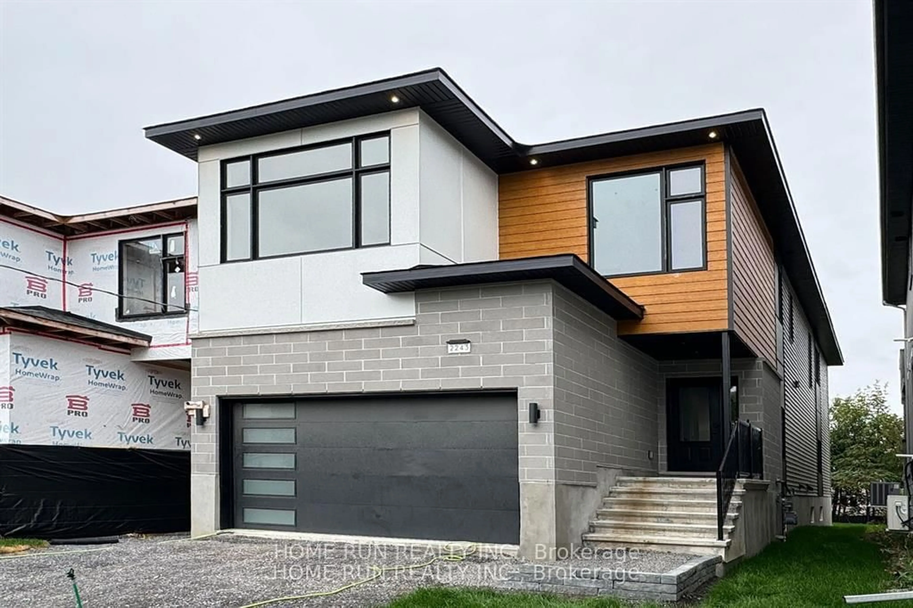 Home with brick exterior material, street for 2241 Page Rd, Orleans Ontario K1C 7K5