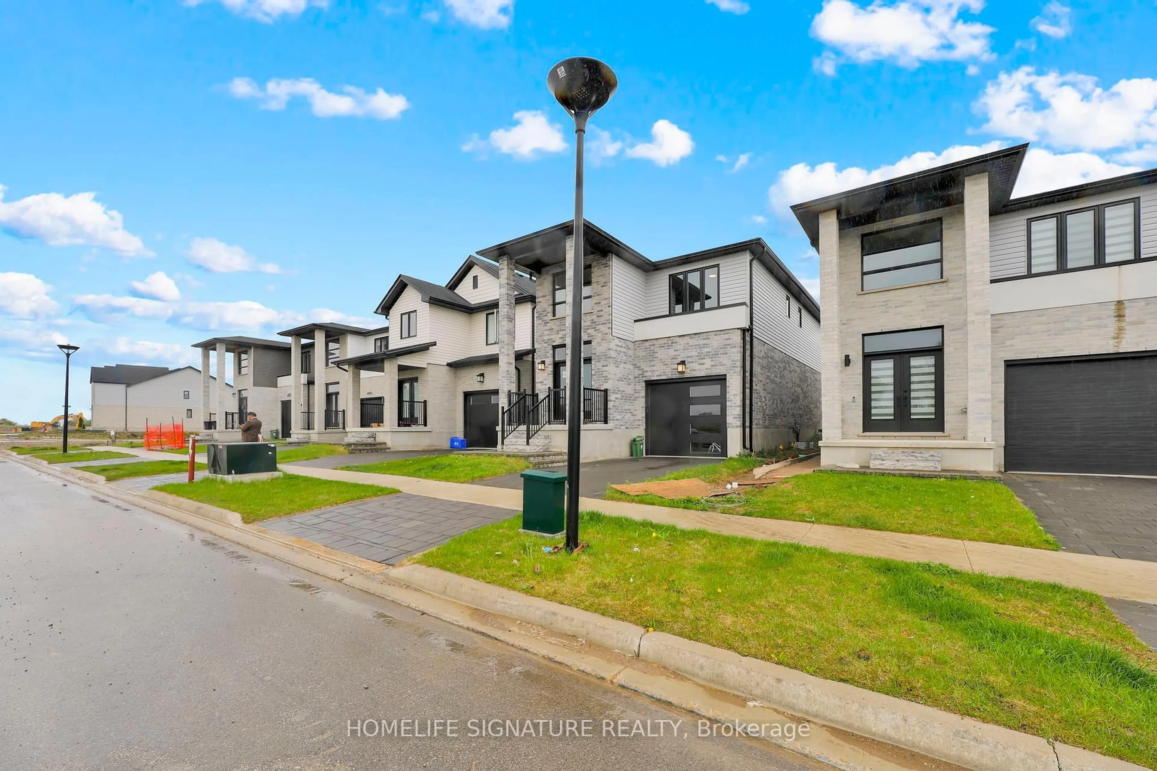 A pic from outside/outdoor area/front of a property/back of a property/a pic from drone, street for 6433 Royal Magnolia Ave, London South Ontario N6P 0K2