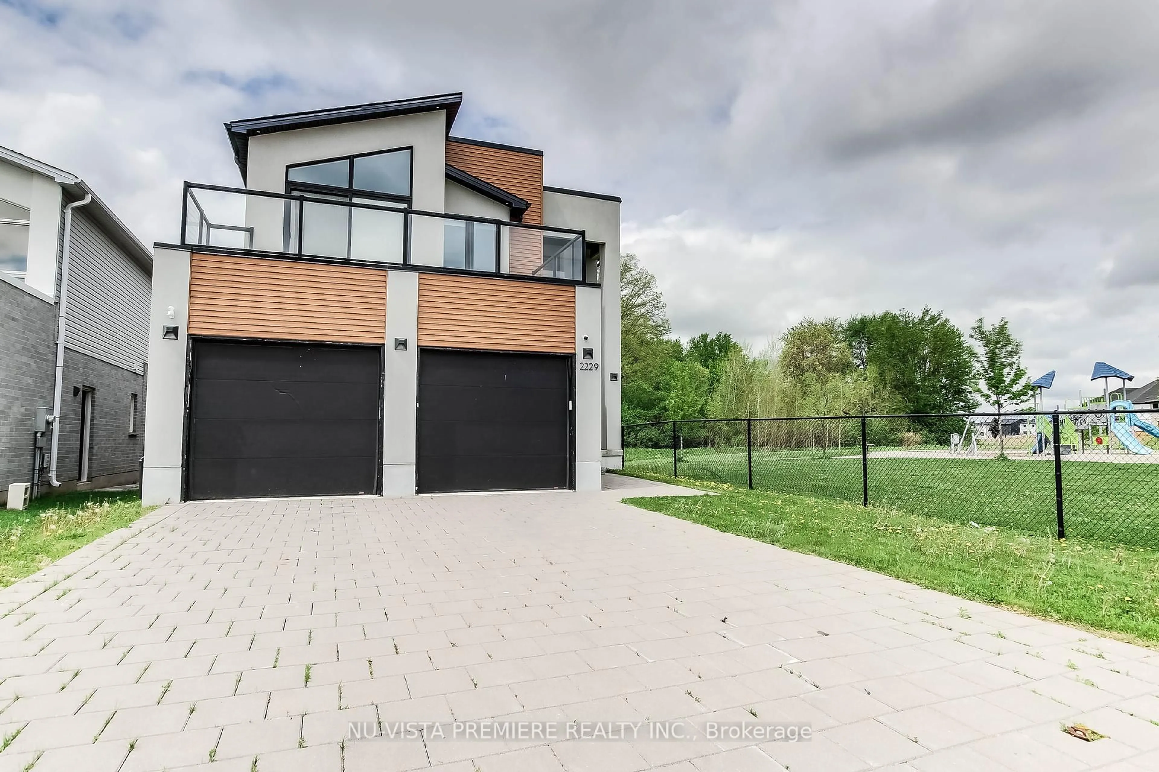 Home with brick exterior material, street for 2229 WATEROAK Dr, London North Ontario N6G 0R1