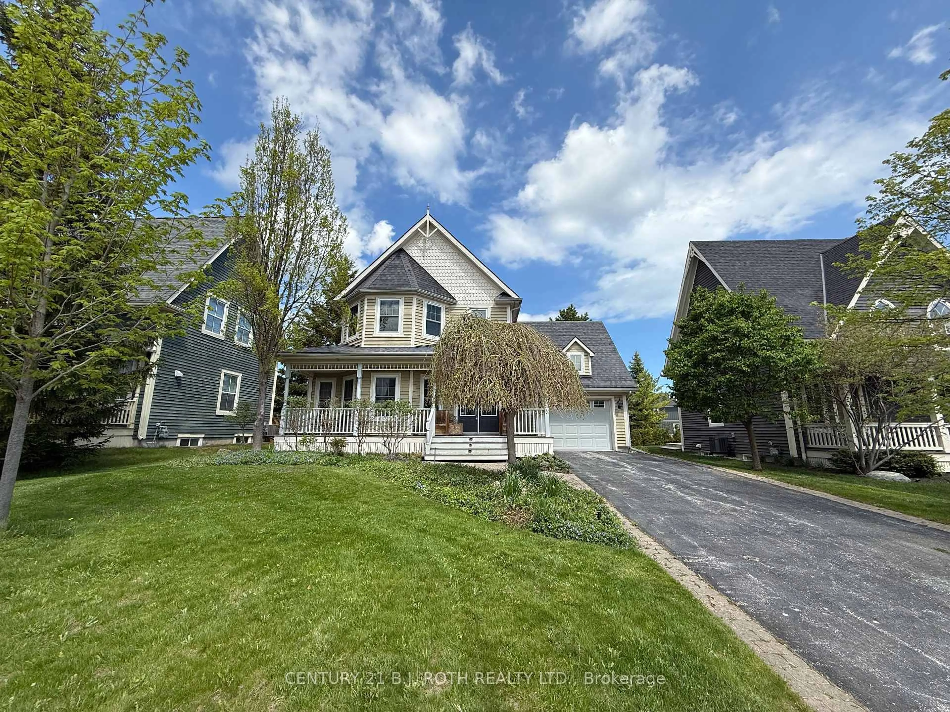 A pic from outside/outdoor area/front of a property/back of a property/a pic from drone, street for 205 Snowbridge Way, Blue Mountains Ontario L9Y 0V1
