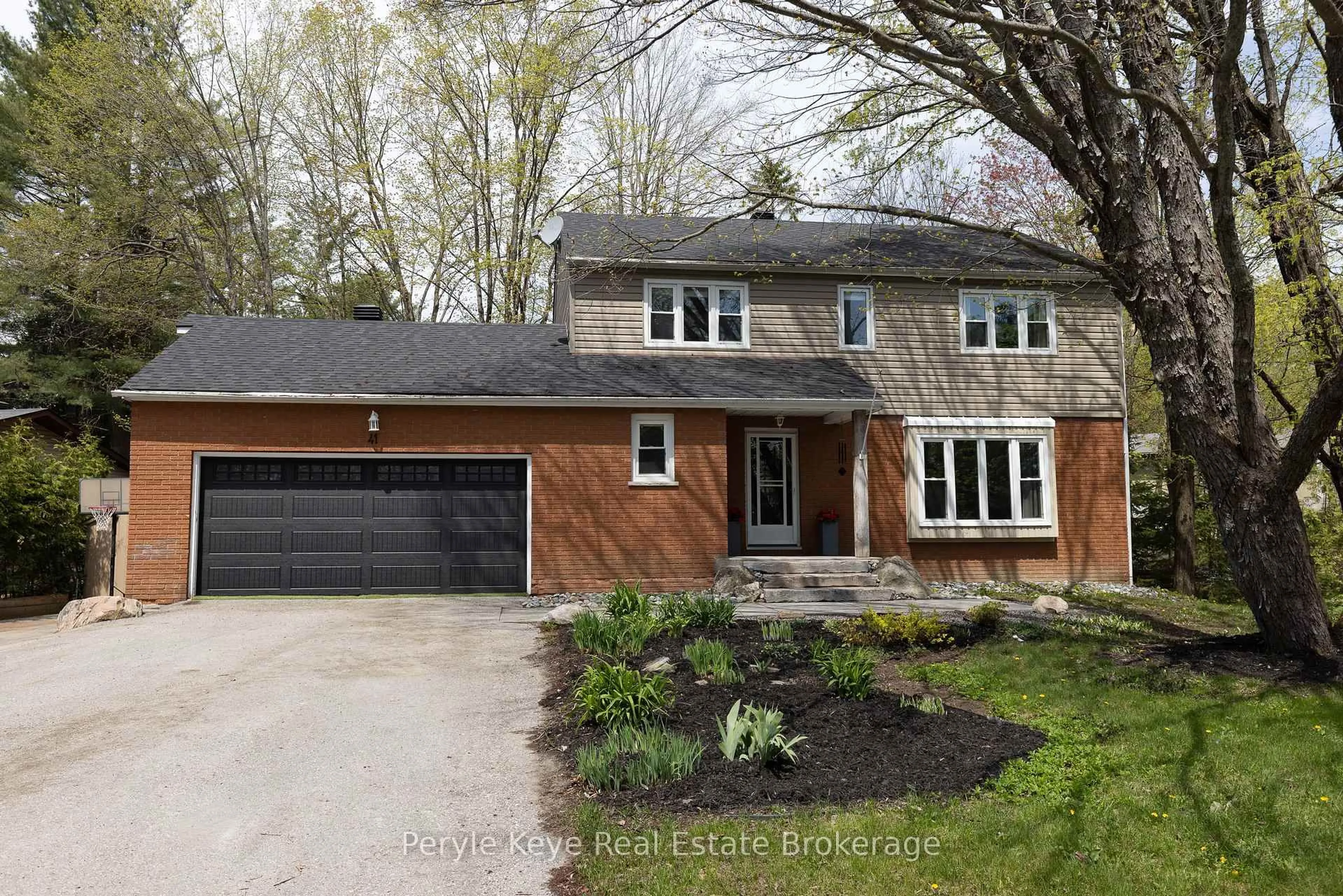 Home with brick exterior material, street for 41 Woodland Dr, Bracebridge Ontario P1L 1M3