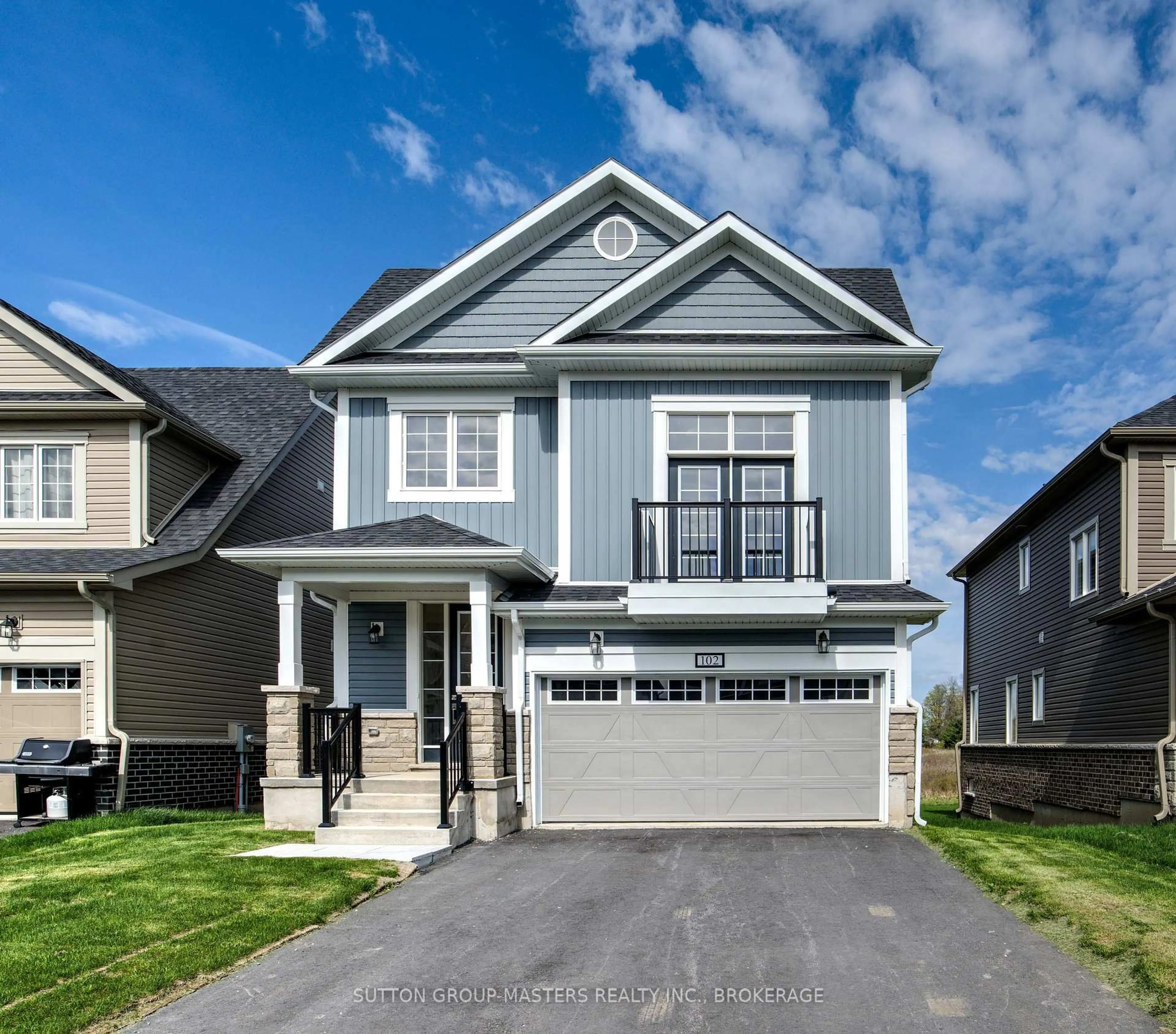 Home with vinyl exterior material, street for 102 Oakmont Dr, Bath Ontario K0H 1G0