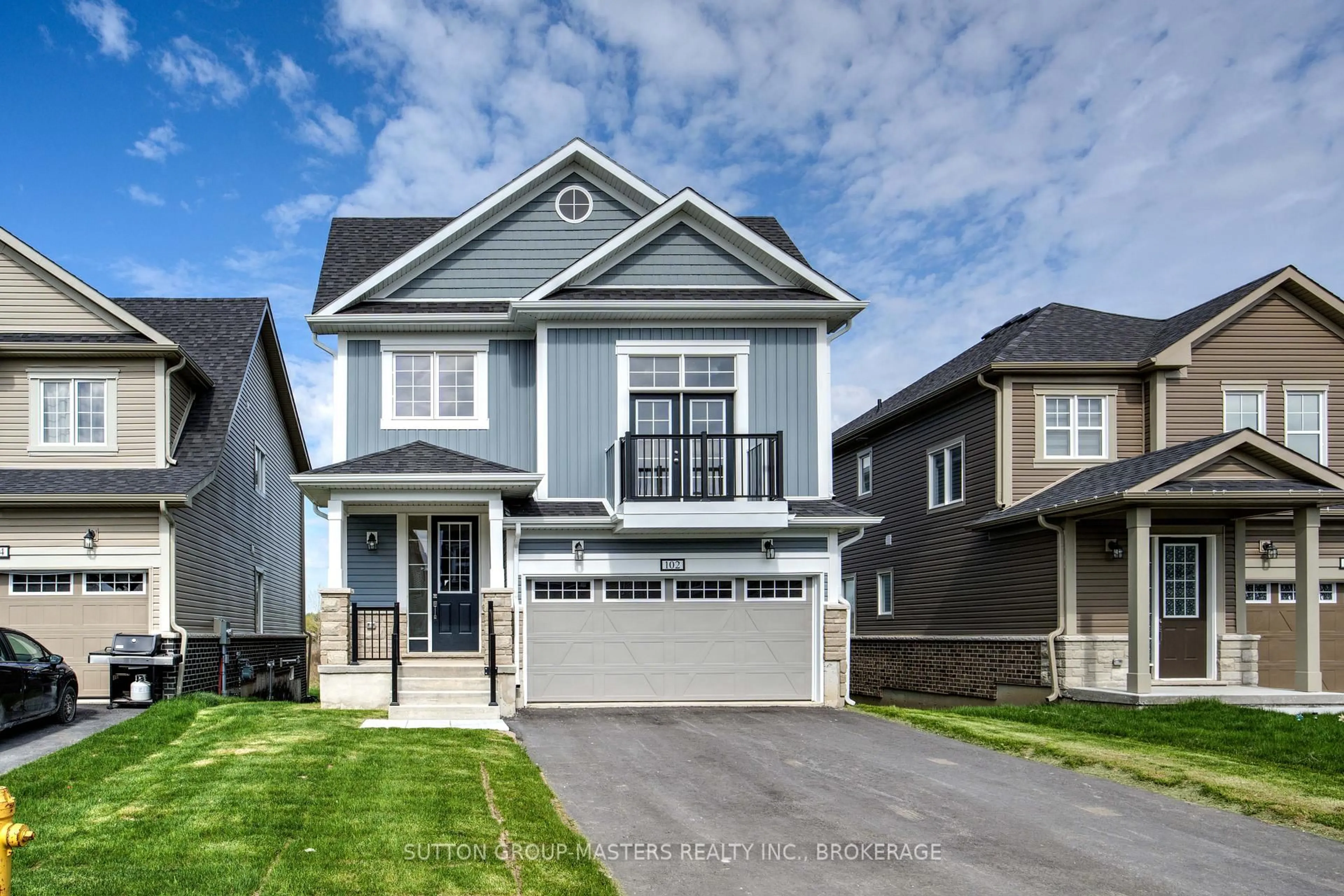 Home with vinyl exterior material, street for 102 Oakmont Dr, Bath Ontario K0H 1G0