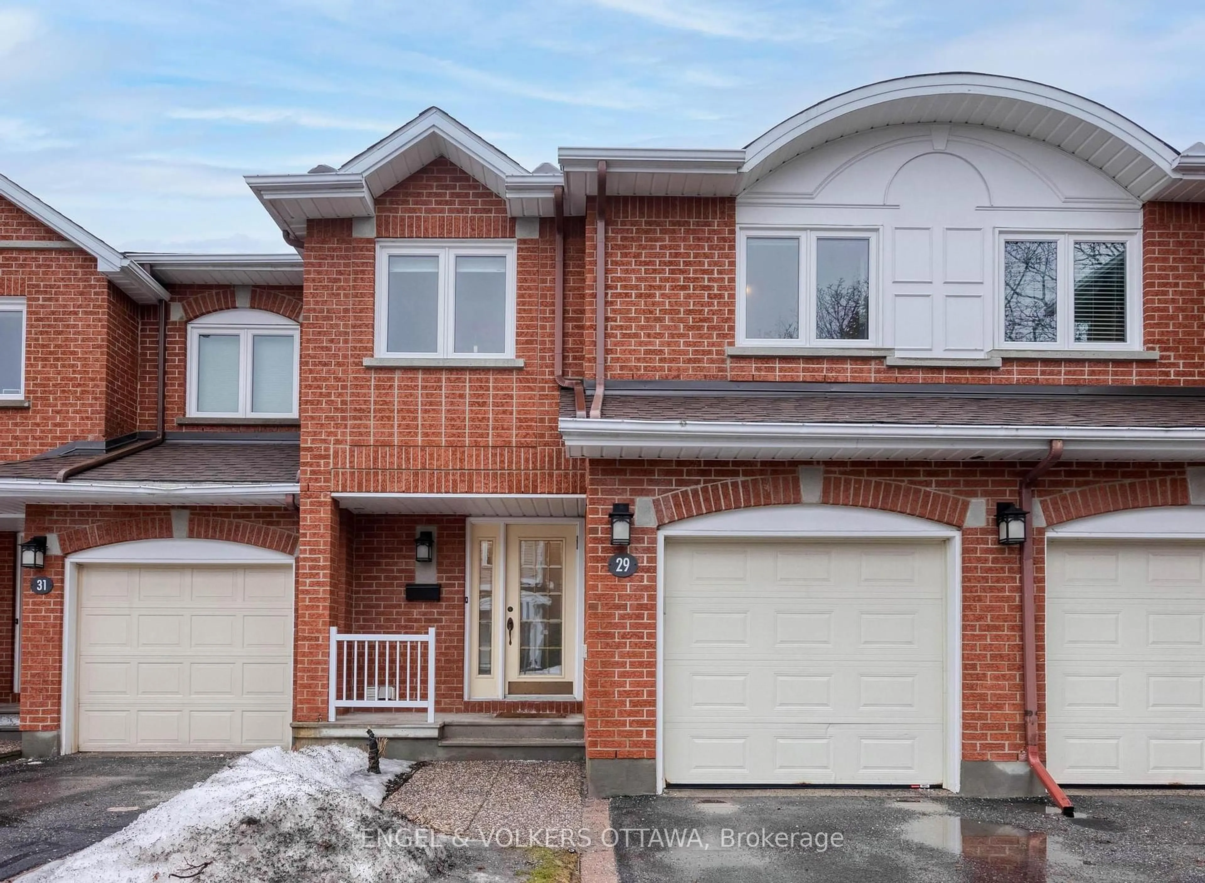 Home with brick exterior material, street for 29 Grandcourt Dr, Ottawa Ontario K2G 5X1