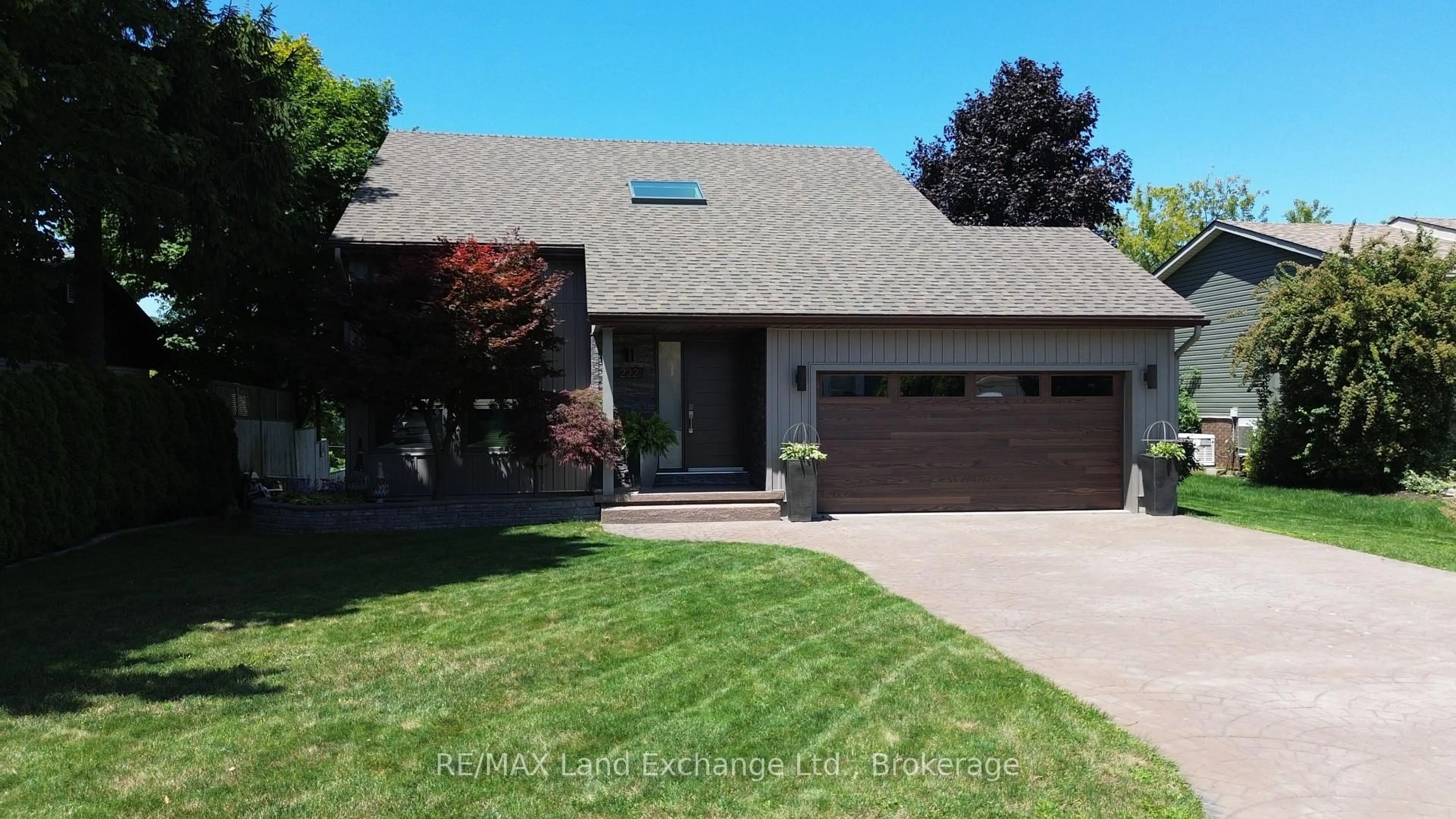 Home with vinyl exterior material, street for 222 Penetangore Row, Kincardine Ontario N2Z 2P6