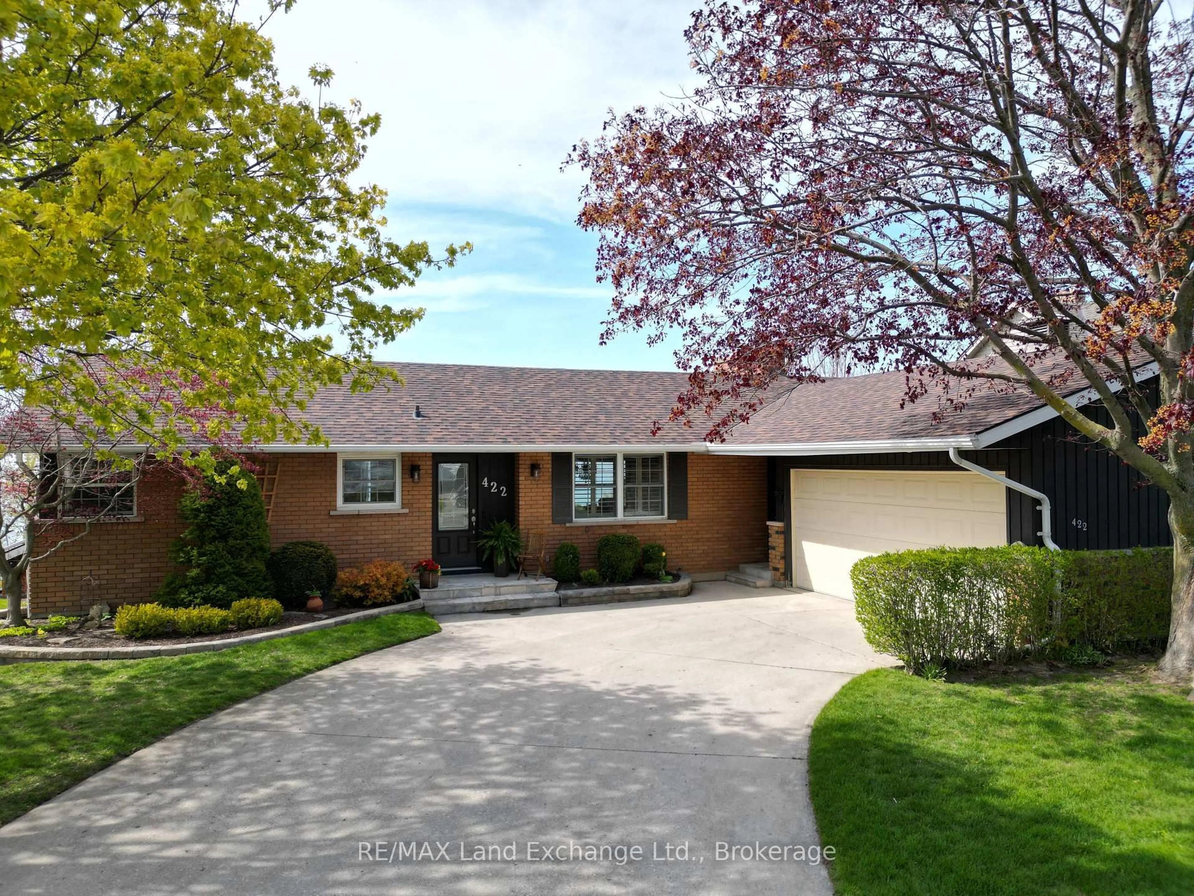 Home with brick exterior material, street for 422 Penetangore Row, Kincardine Ontario N2Z 2J7