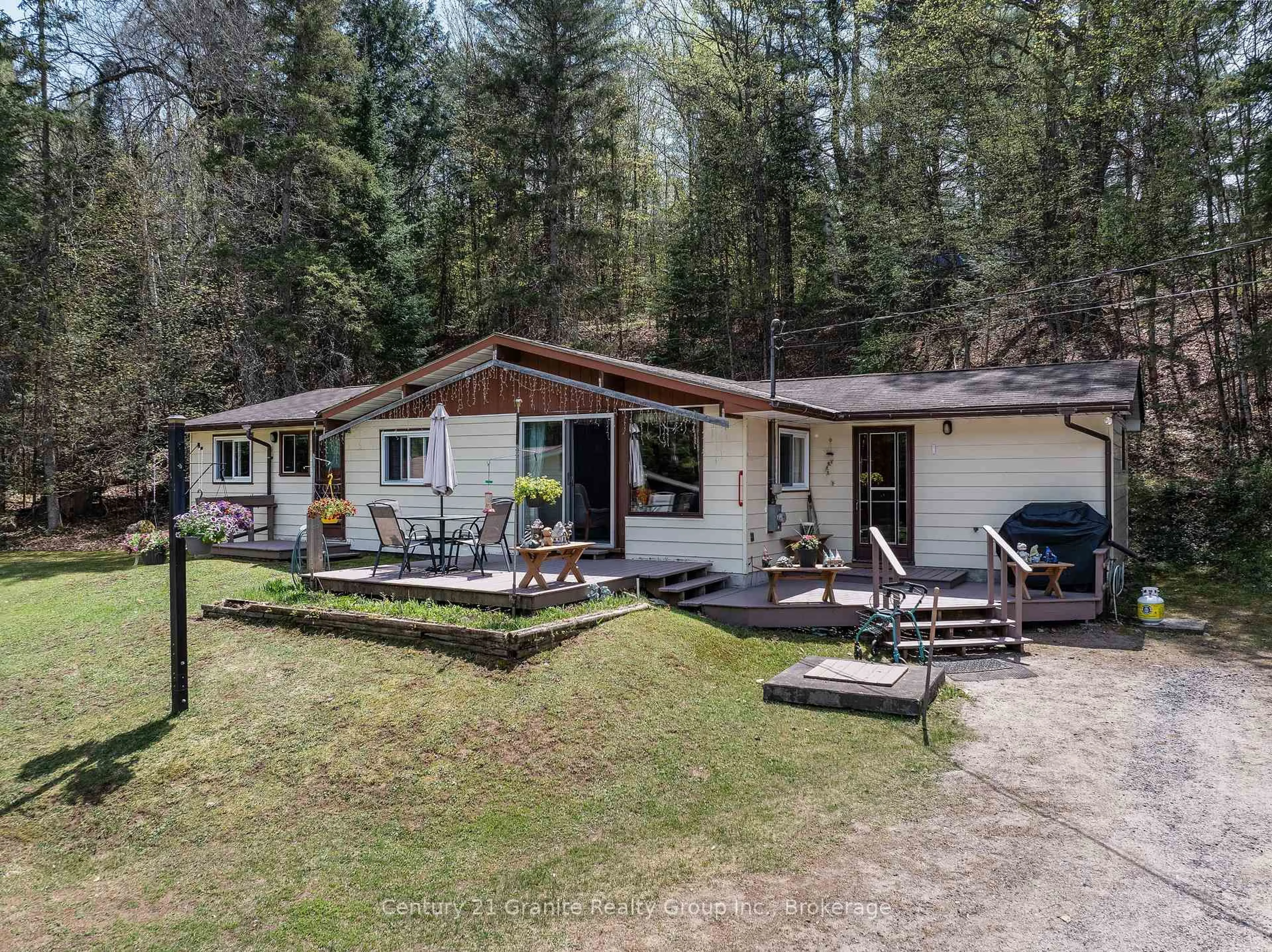 A pic from outside/outdoor area/front of a property/back of a property/a pic from drone, unknown for 1036 Wandering Lane, Algonquin Highlands Ontario K0M 1S0