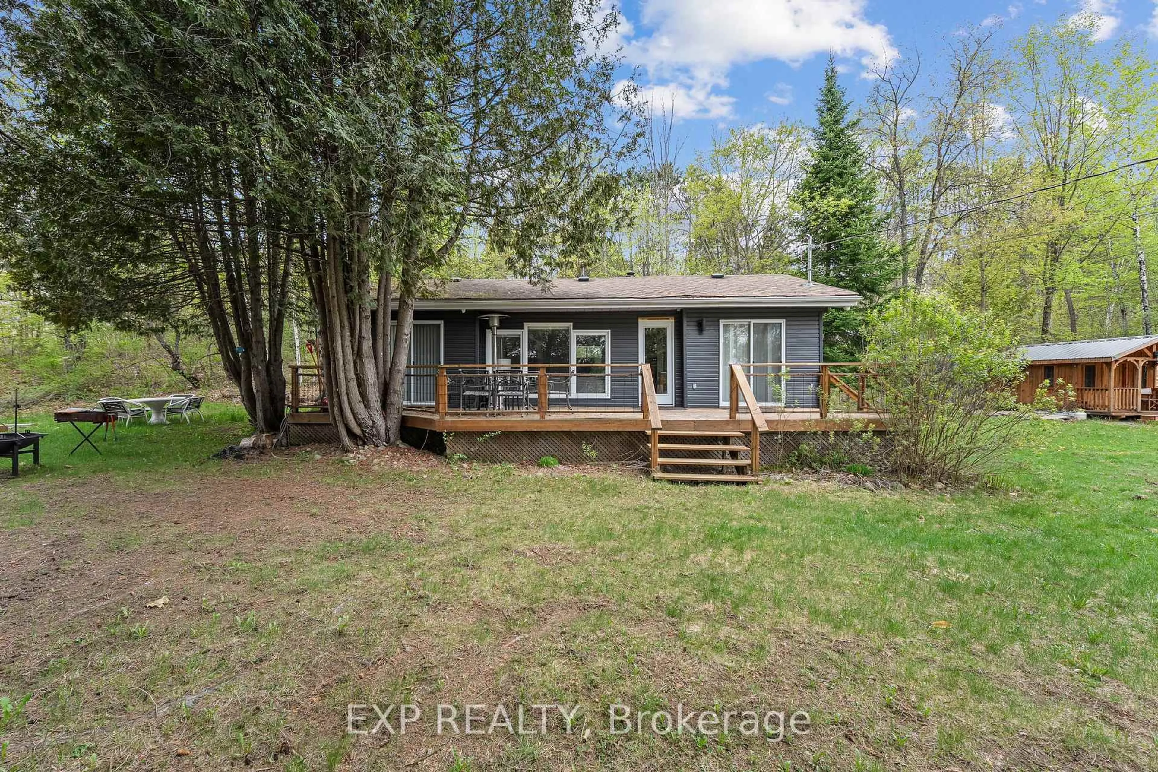 A pic from outside/outdoor area/front of a property/back of a property/a pic from drone, unknown for 1044 Shanahan Tr, Minden Hills Ontario K0M 2K0