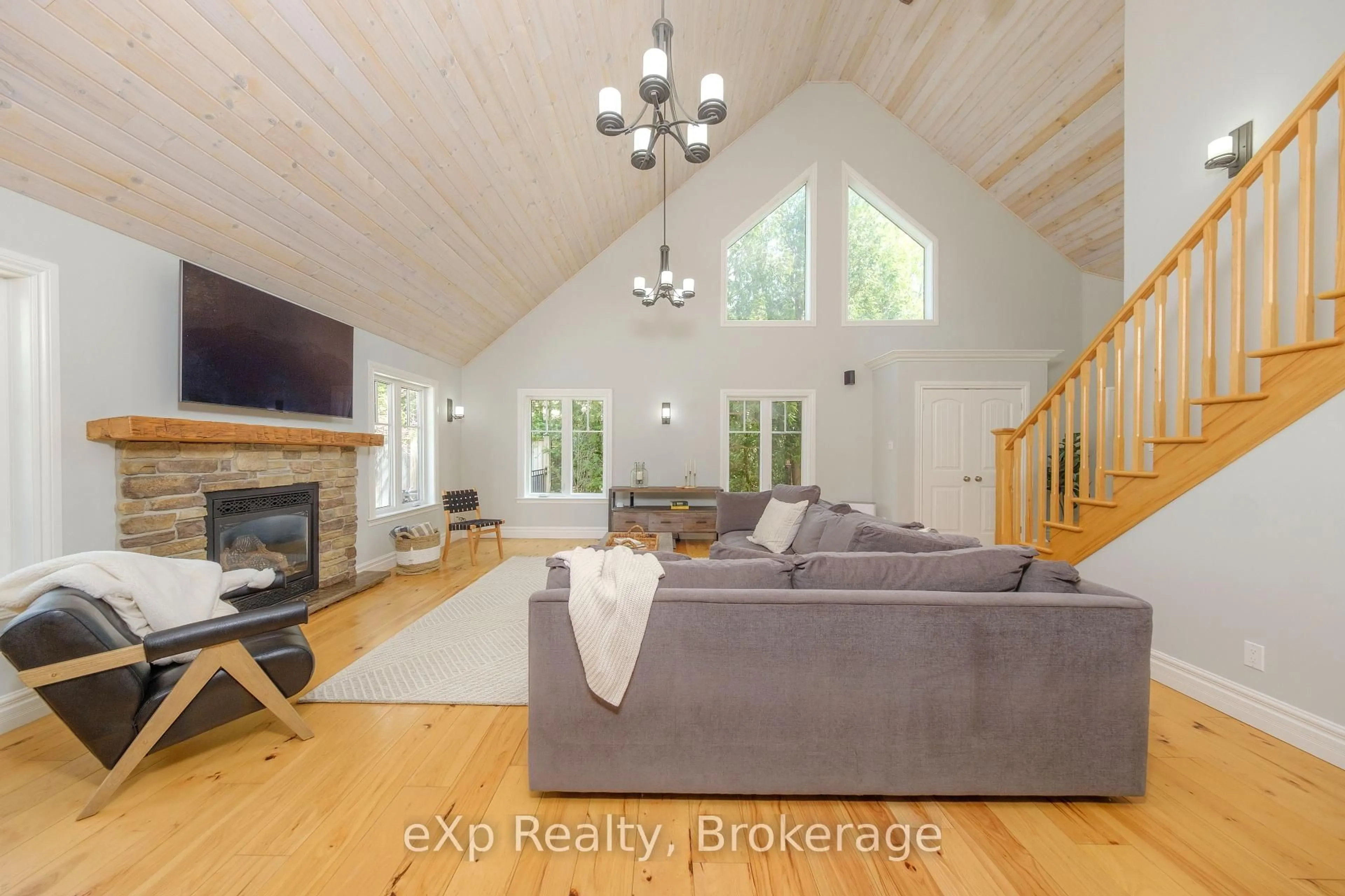 Living room with furniture, wood/laminate floor for 465 Creekwood Dr, Saugeen Shores Ontario N0H 2L0