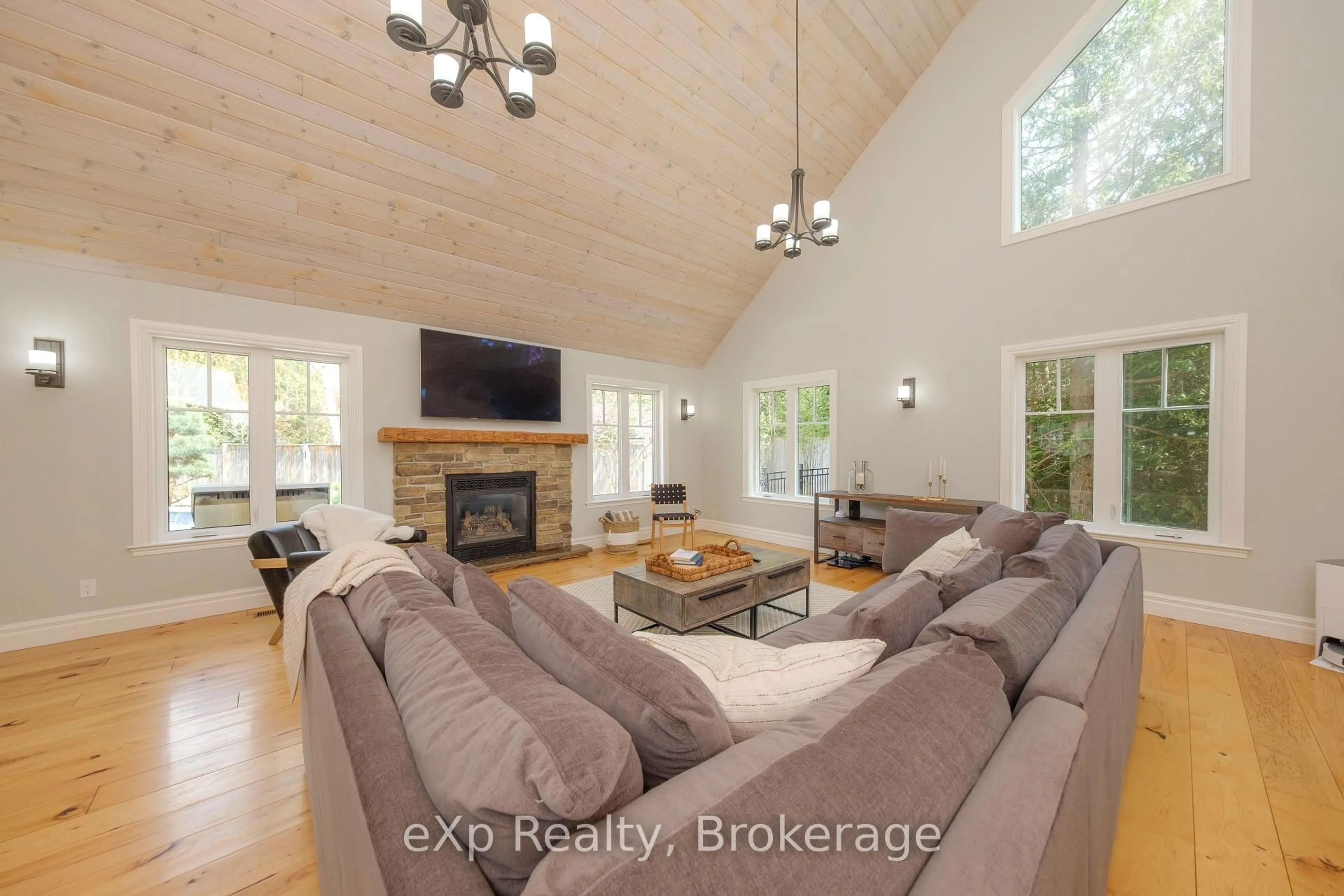 Living room with furniture, wood/laminate floor for 465 Creekwood Dr, Saugeen Shores Ontario N0H 2L0