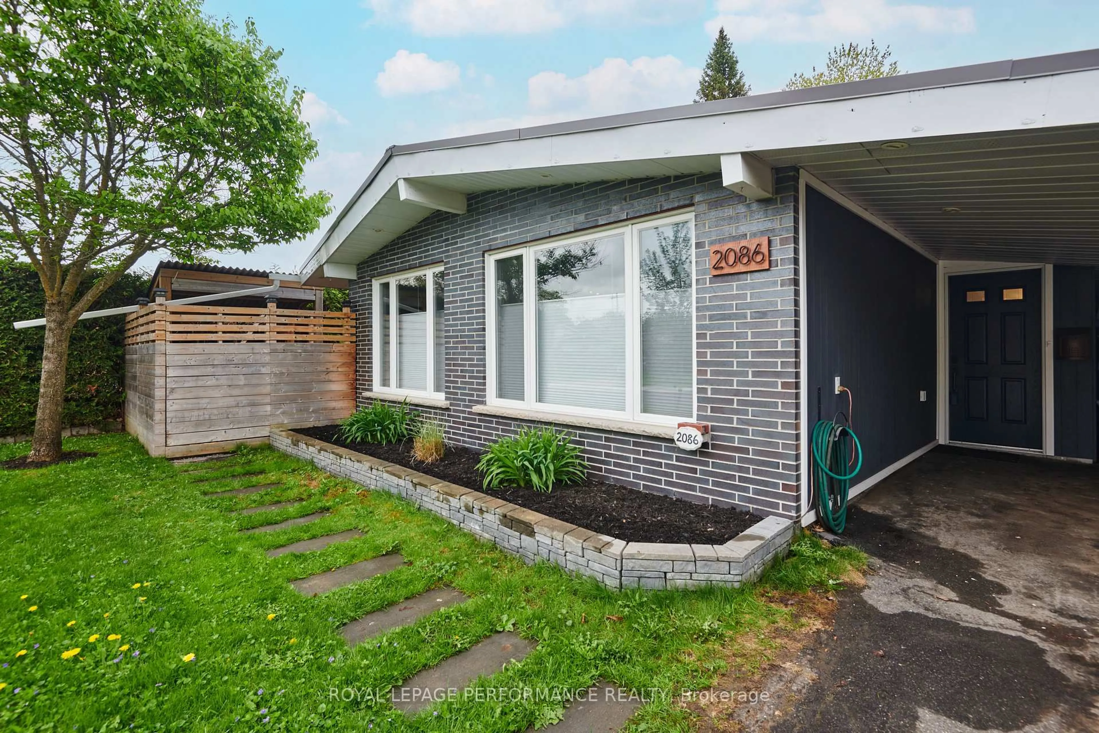 Home with brick exterior material, street for 2086 Valley Dr, Ottawa Ontario K1G 2P5