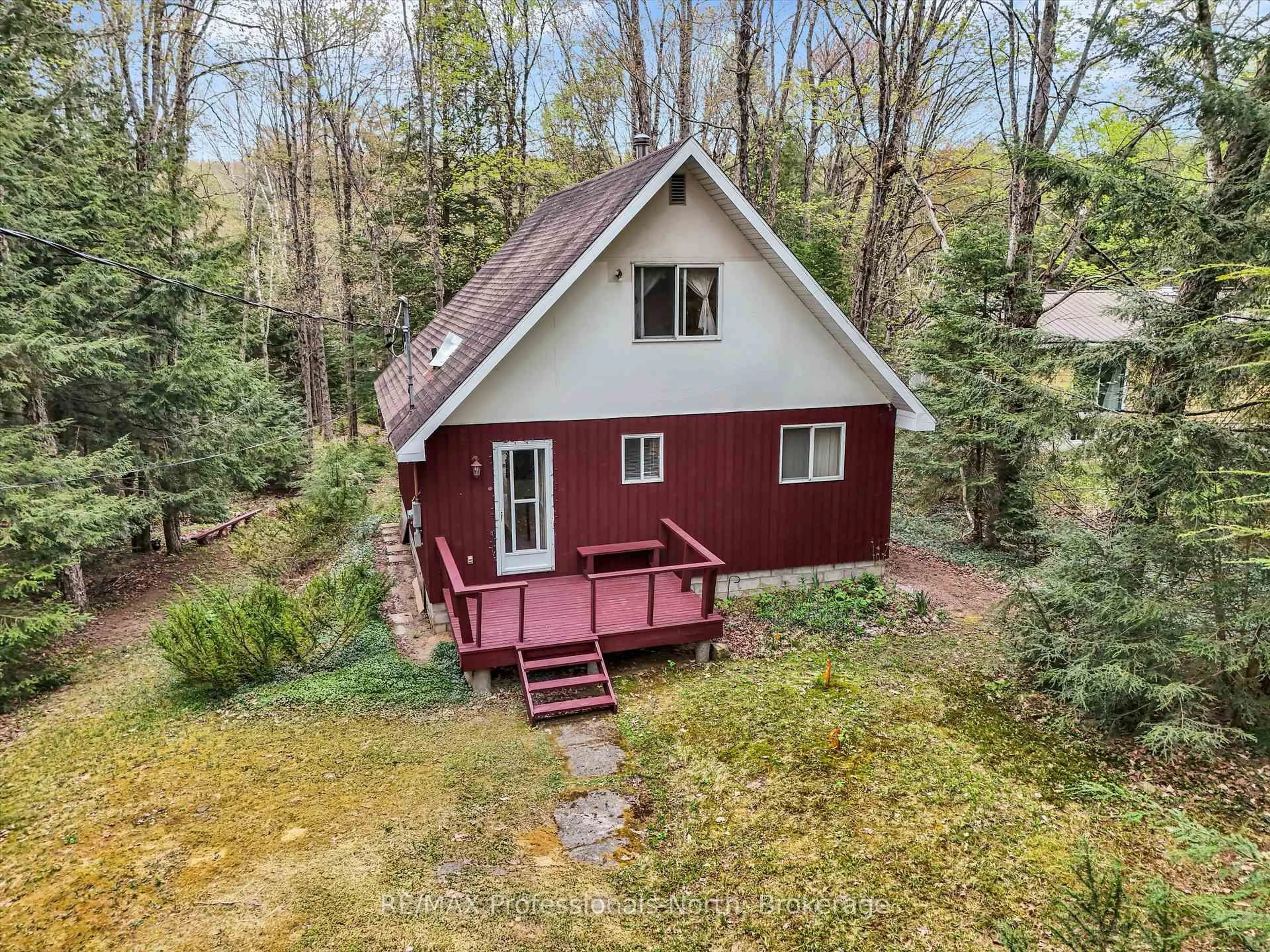 A pic from outside/outdoor area/front of a property/back of a property/a pic from drone, water/lake/river/ocean view for 1165 Sherwood Forest Rd, Bracebridge Ontario P1L 1X3