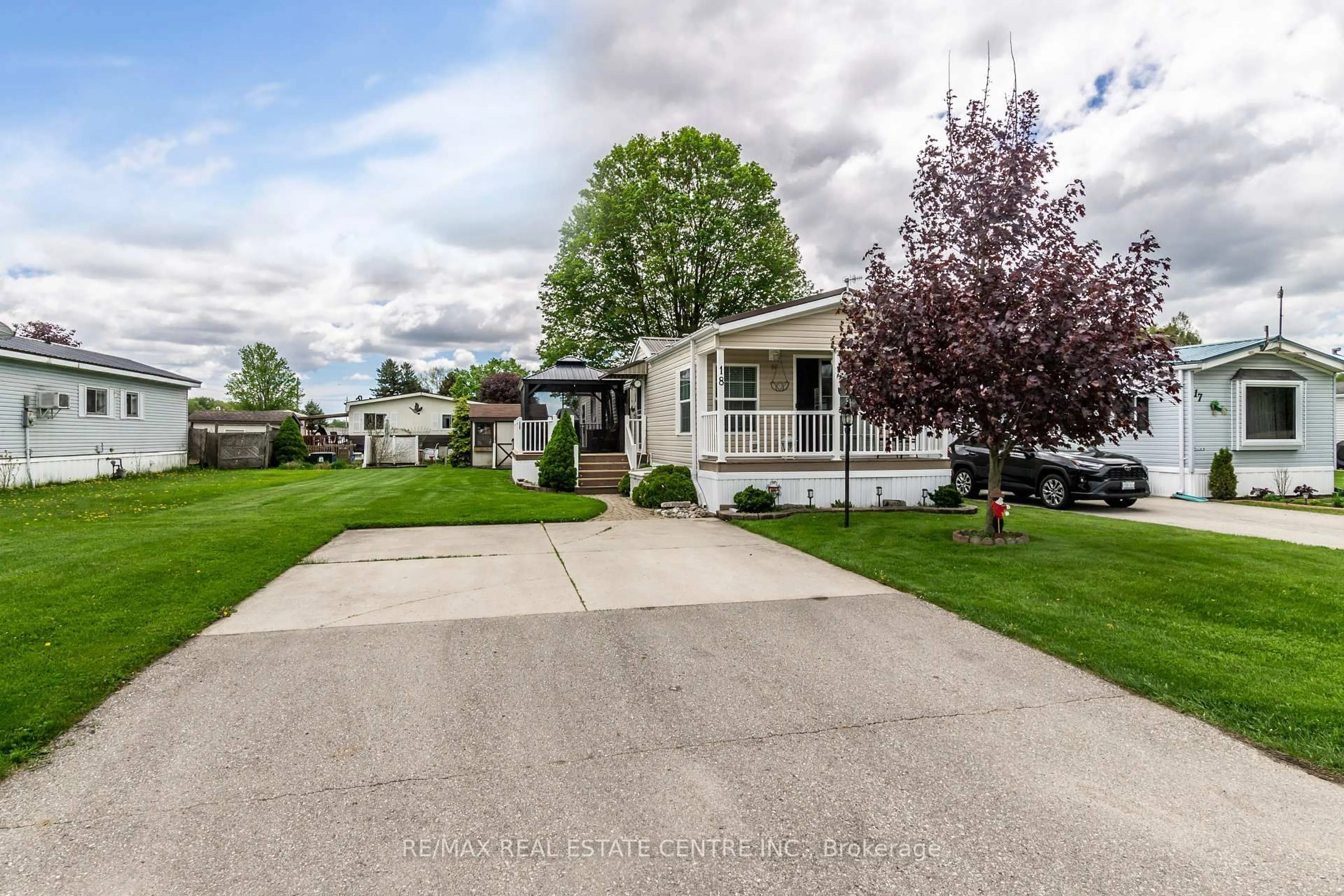 Home with vinyl exterior material, street for 11981 PLANK Rd #18, Bayham Ontario N4G 4G9