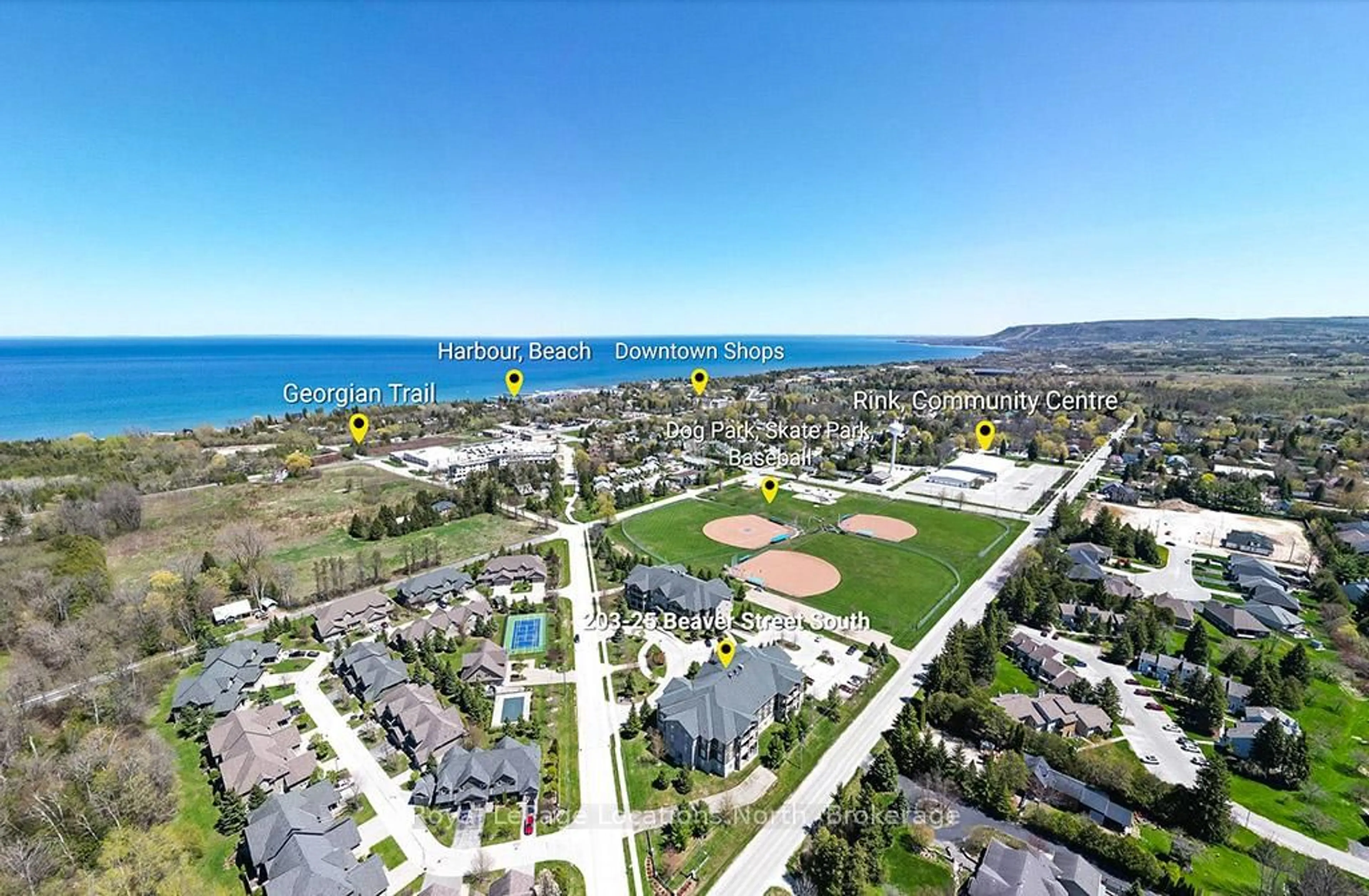 A pic from outside/outdoor area/front of a property/back of a property/a pic from drone, water/lake/river/ocean view for 25 Beaver St #203, Blue Mountains Ontario N0H 2P0