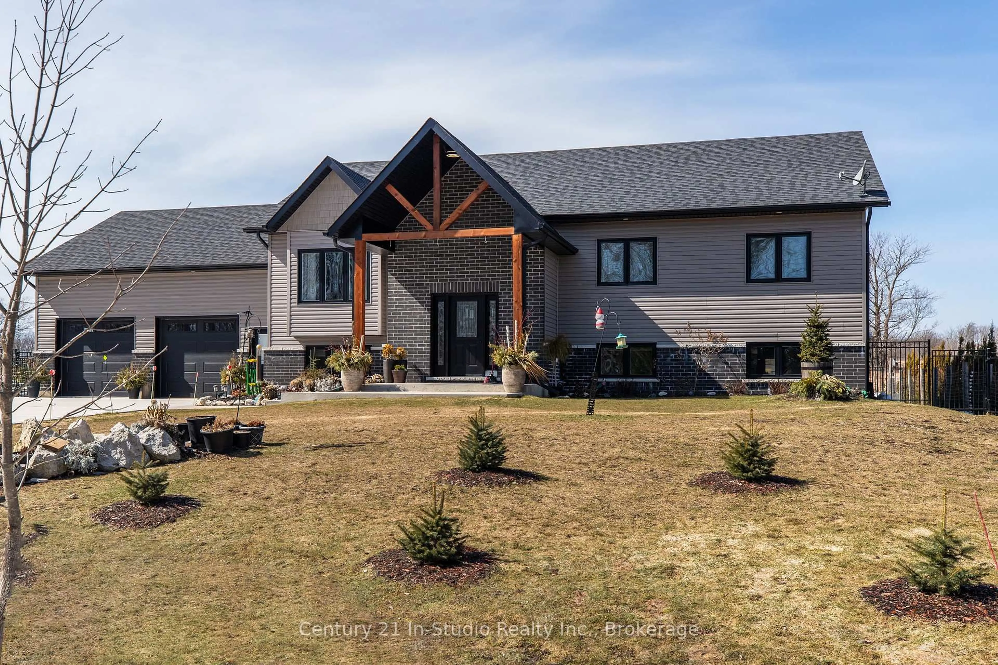 A pic from outside/outdoor area/front of a property/back of a property/a pic from drone, mountain view for 73 Everett Rd, South Bruce Peninsula Ontario N0H 2T0