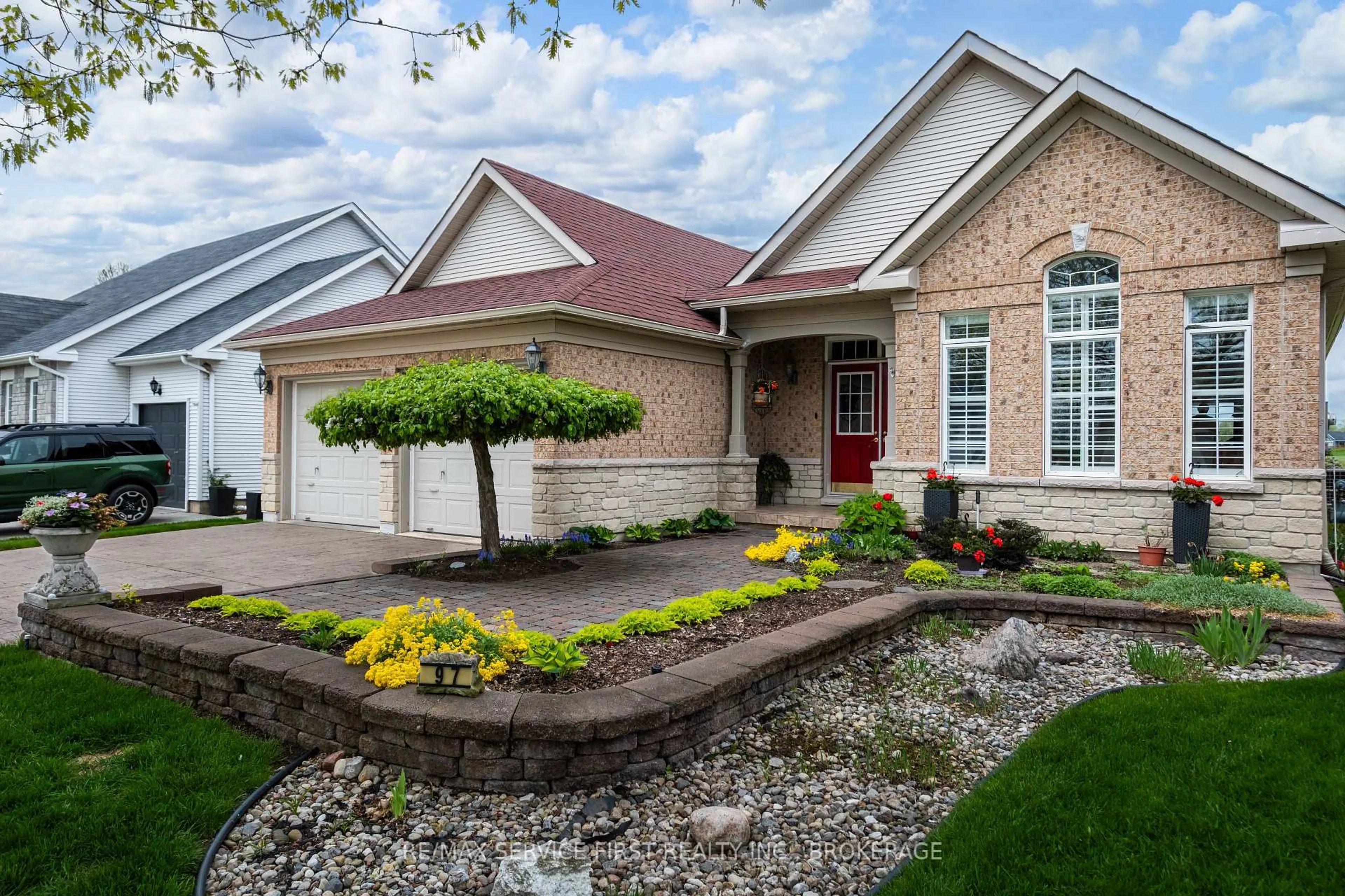 Home with brick exterior material, street for 97 Abbey Dawn Dr, Bath Ontario K0H 1G0
