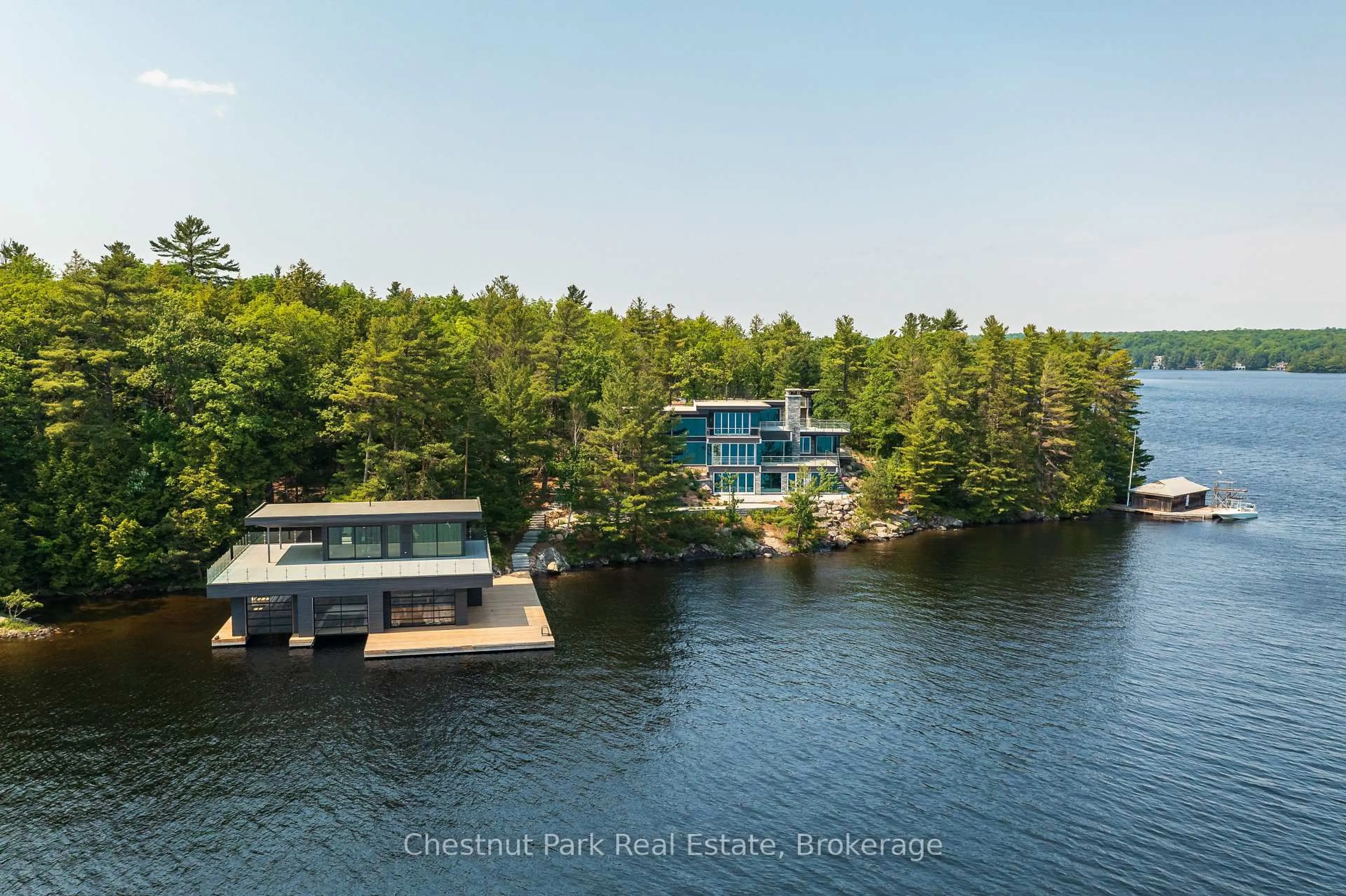 A pic from outside/outdoor area/front of a property/back of a property/a pic from drone, water/lake/river/ocean view for 1 BASS N/A, Muskoka Lakes Ontario P0B 1A0