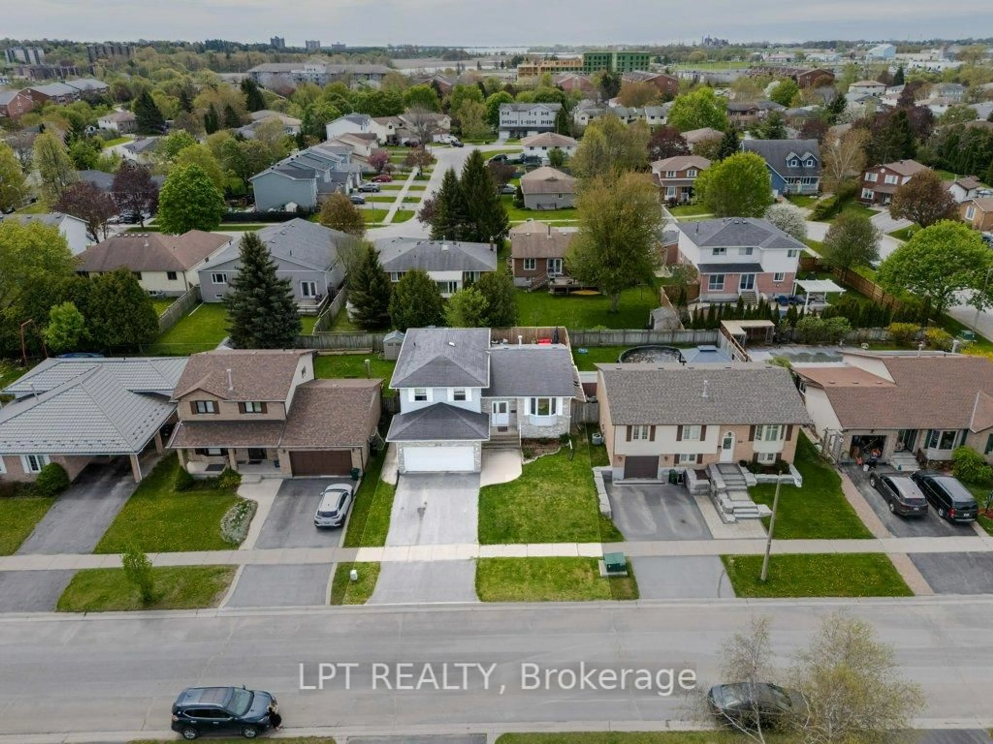 A pic from outside/outdoor area/front of a property/back of a property/a pic from drone, street for 304 Sunrise Cres, Kingston Ontario K7M 8C3