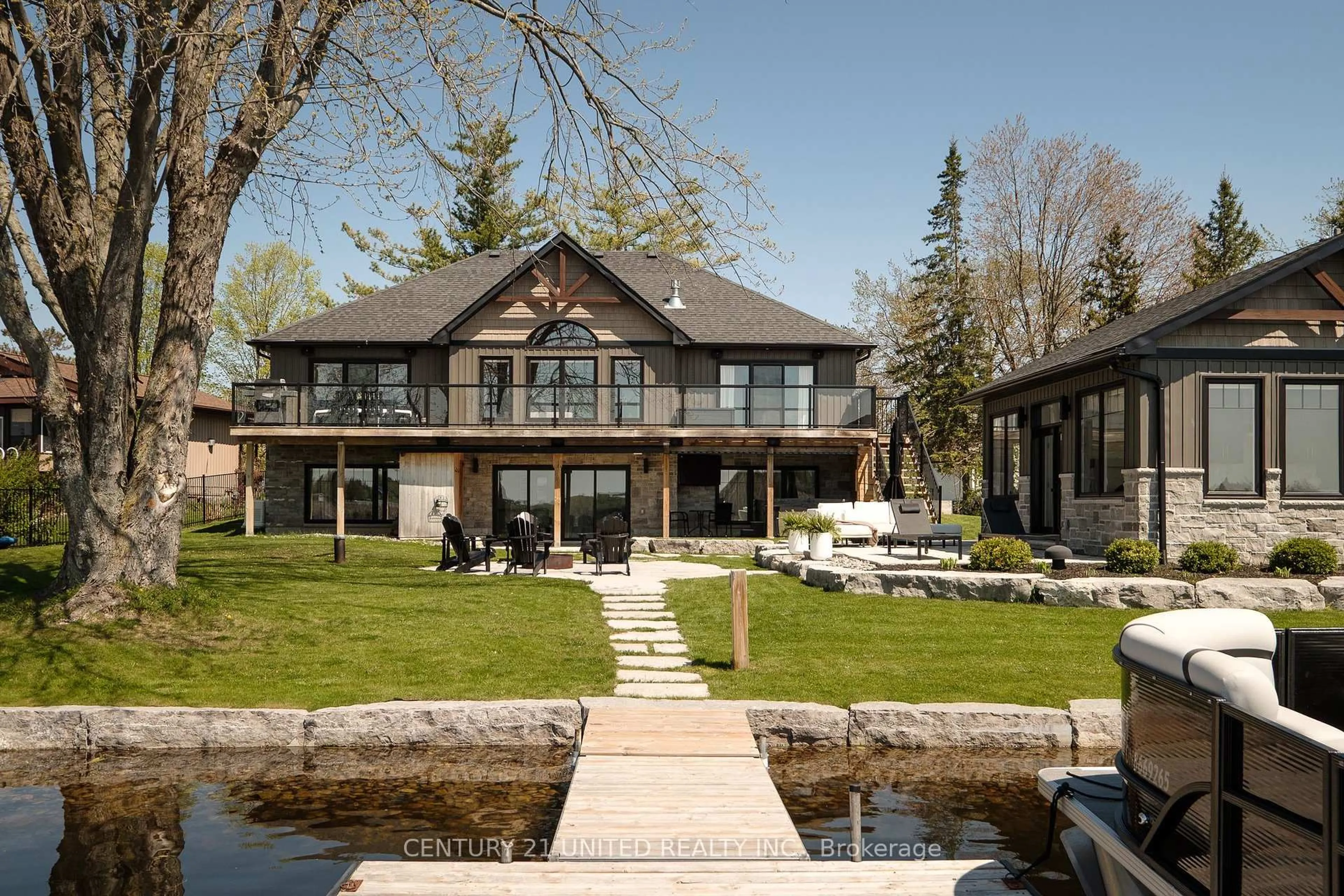 Home with brick exterior material, water/lake/river/ocean view for 1168 Roger Pl, Selwyn Ontario K0L 1T0