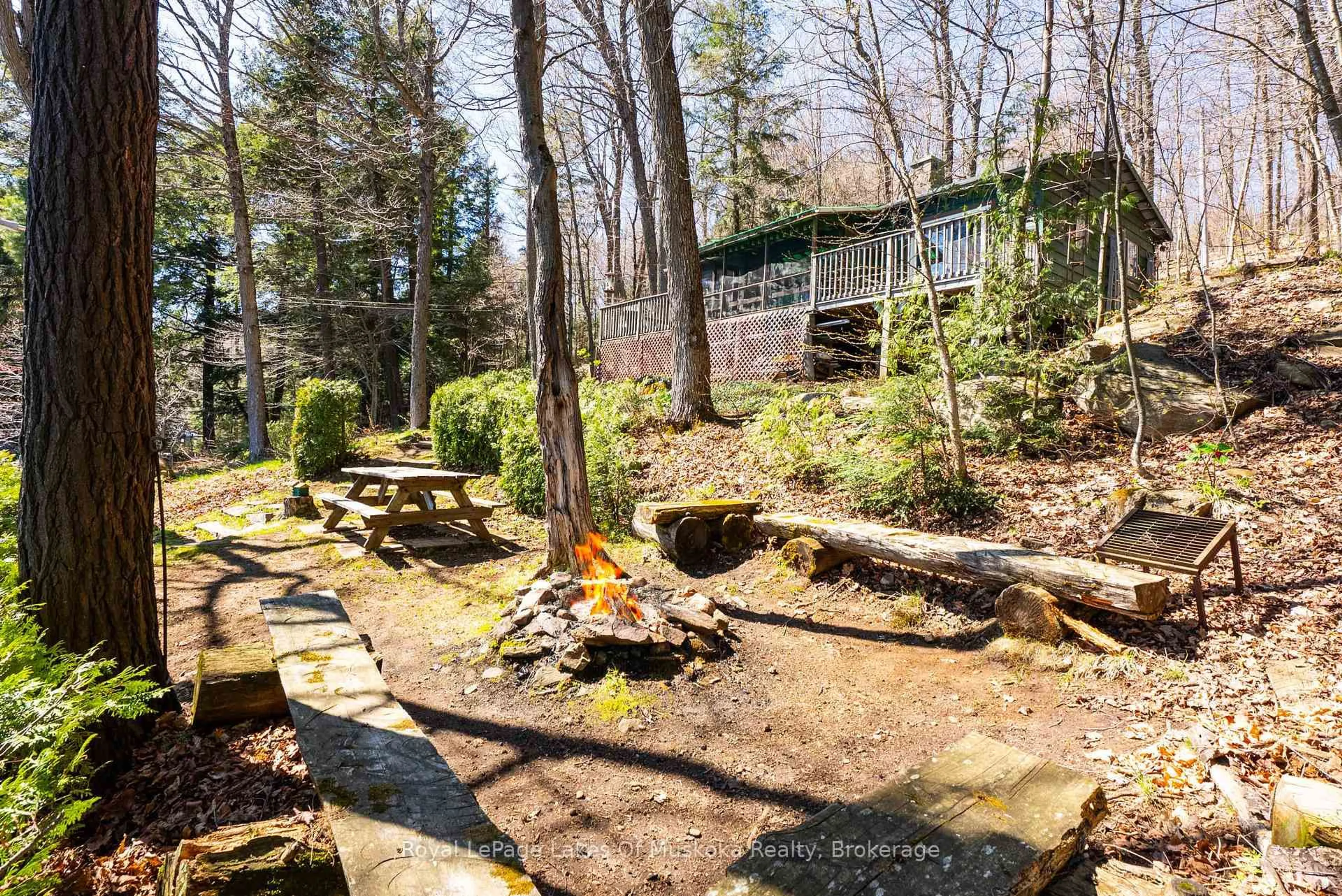 Patio, forest/trees view for 1002 Camp Lake Rd, Lake of Bays Ontario P1H 2J6
