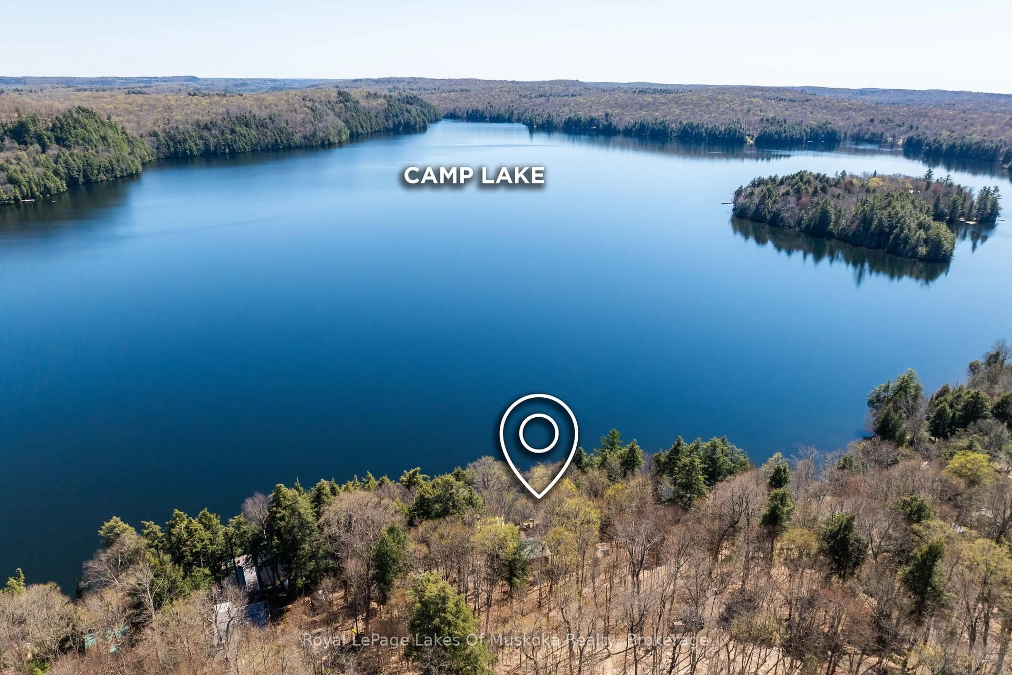 A pic from outside/outdoor area/front of a property/back of a property/a pic from drone, water/lake/river/ocean view for 1002 Camp Lake Rd, Lake of Bays Ontario P1H 2J6