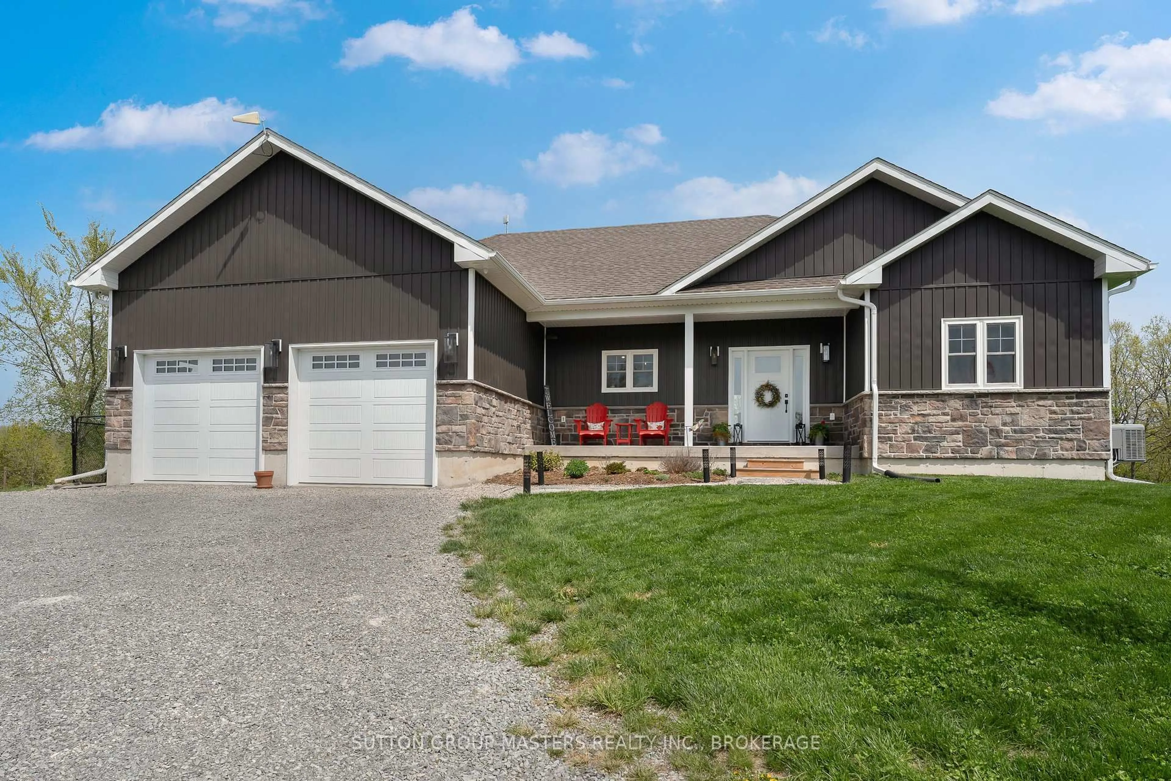Home with vinyl exterior material, street for 6909 Battersea Rd, Battersea Ontario K0H 1H0