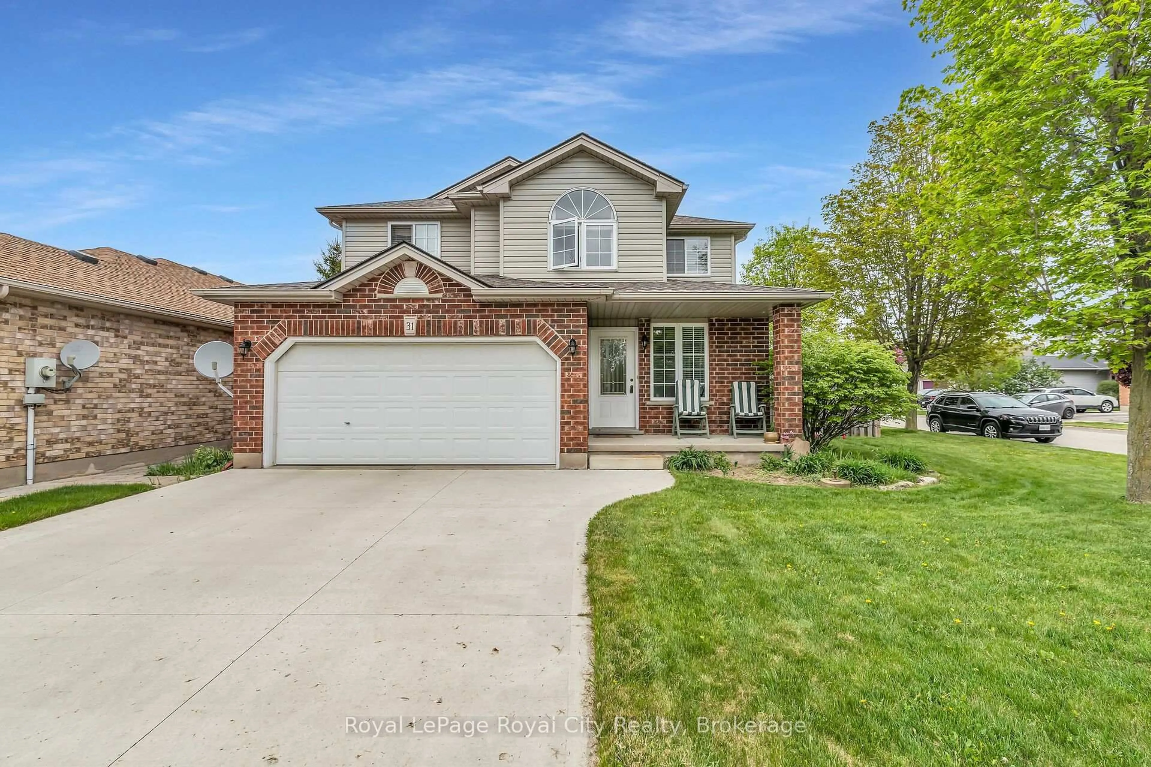 Home with brick exterior material, street for 31 Paulstown Cres, Guelph Ontario N1G 5H7
