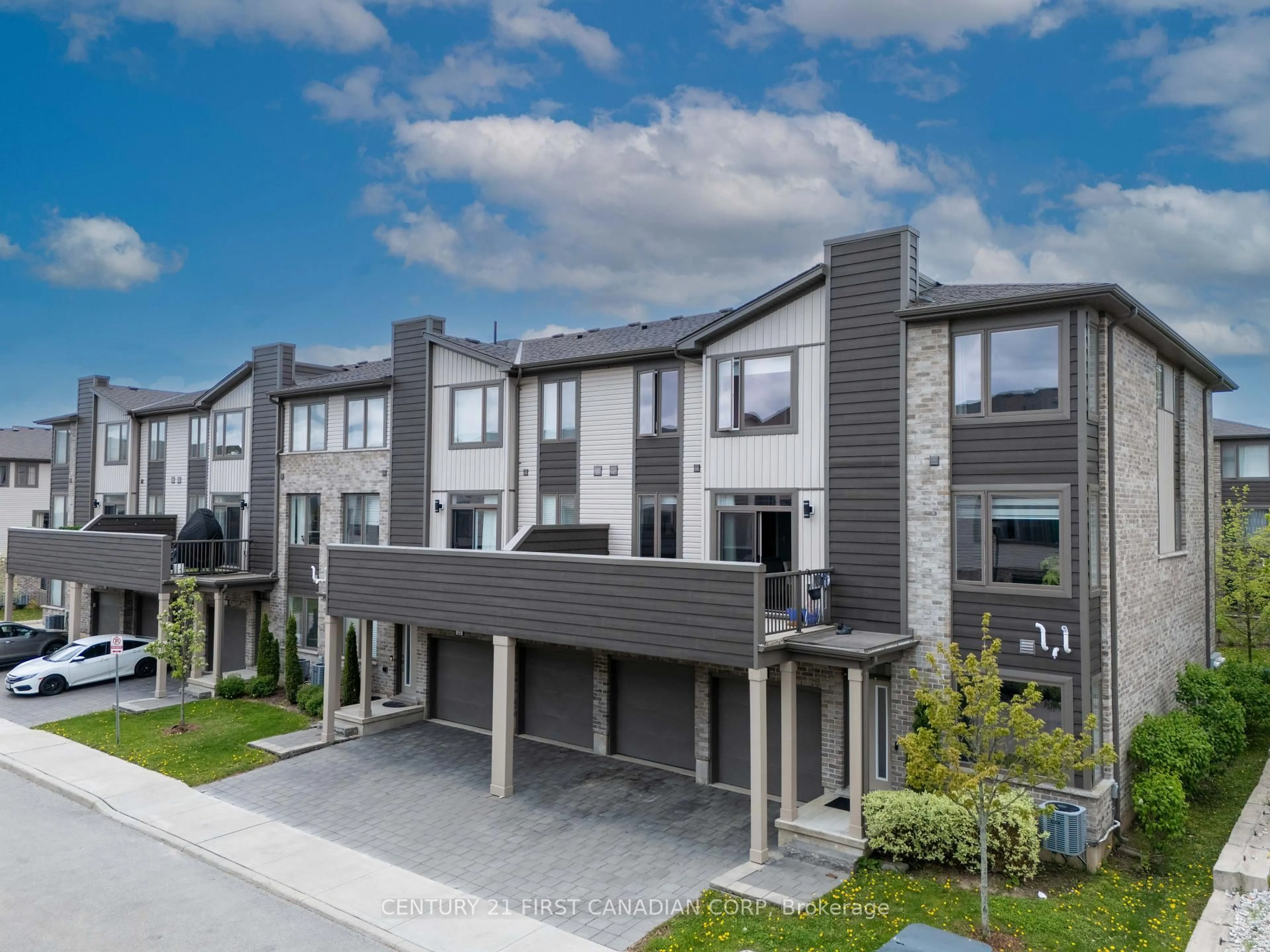 A pic from outside/outdoor area/front of a property/back of a property/a pic from drone, street for 2070 Meadowgate Blvd #25, London South Ontario N6M 0H5
