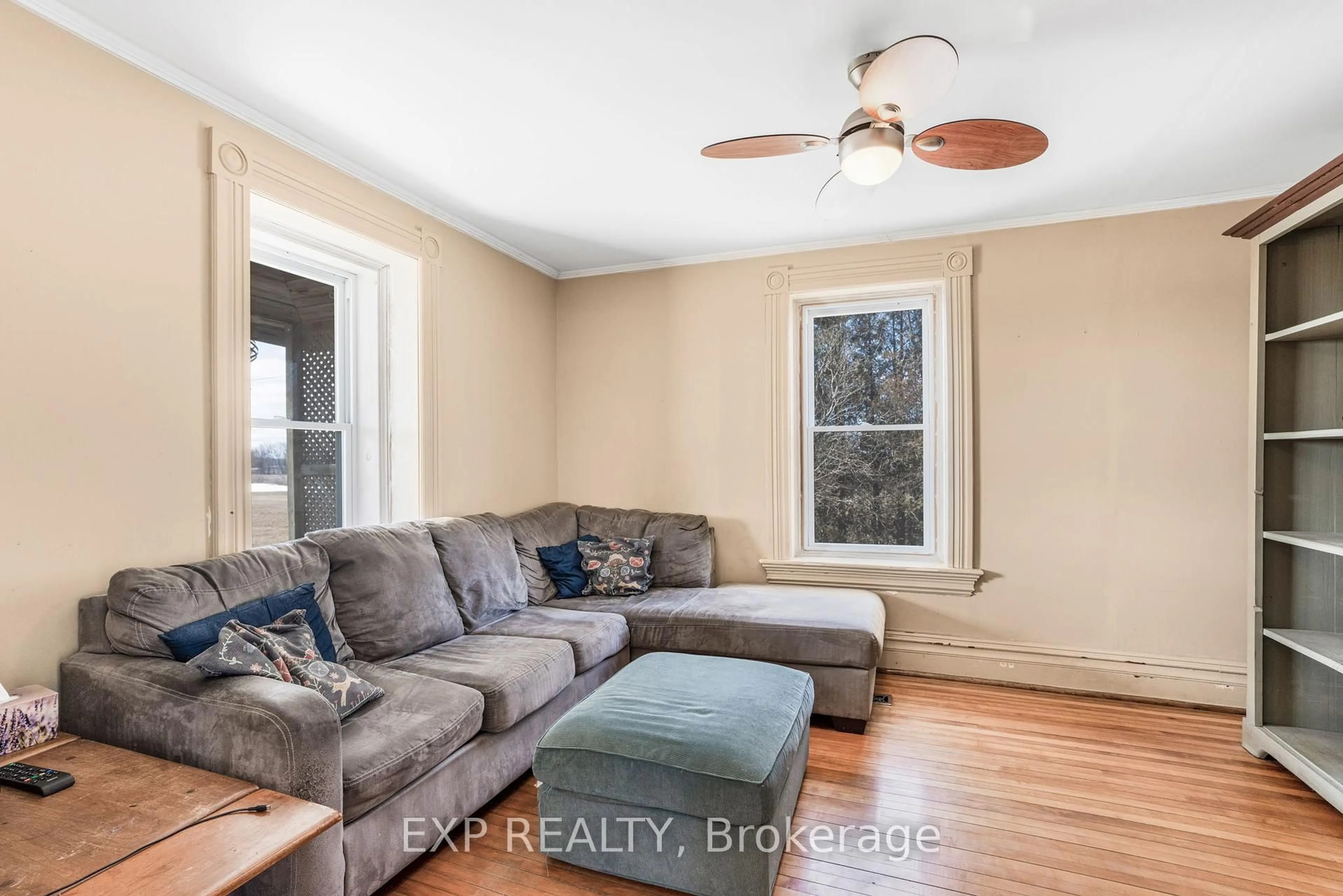 Living room with furniture, wood/laminate floor for 20405 Laggan-Glenelg Rd, North Glengarry Ontario K0B 1E0