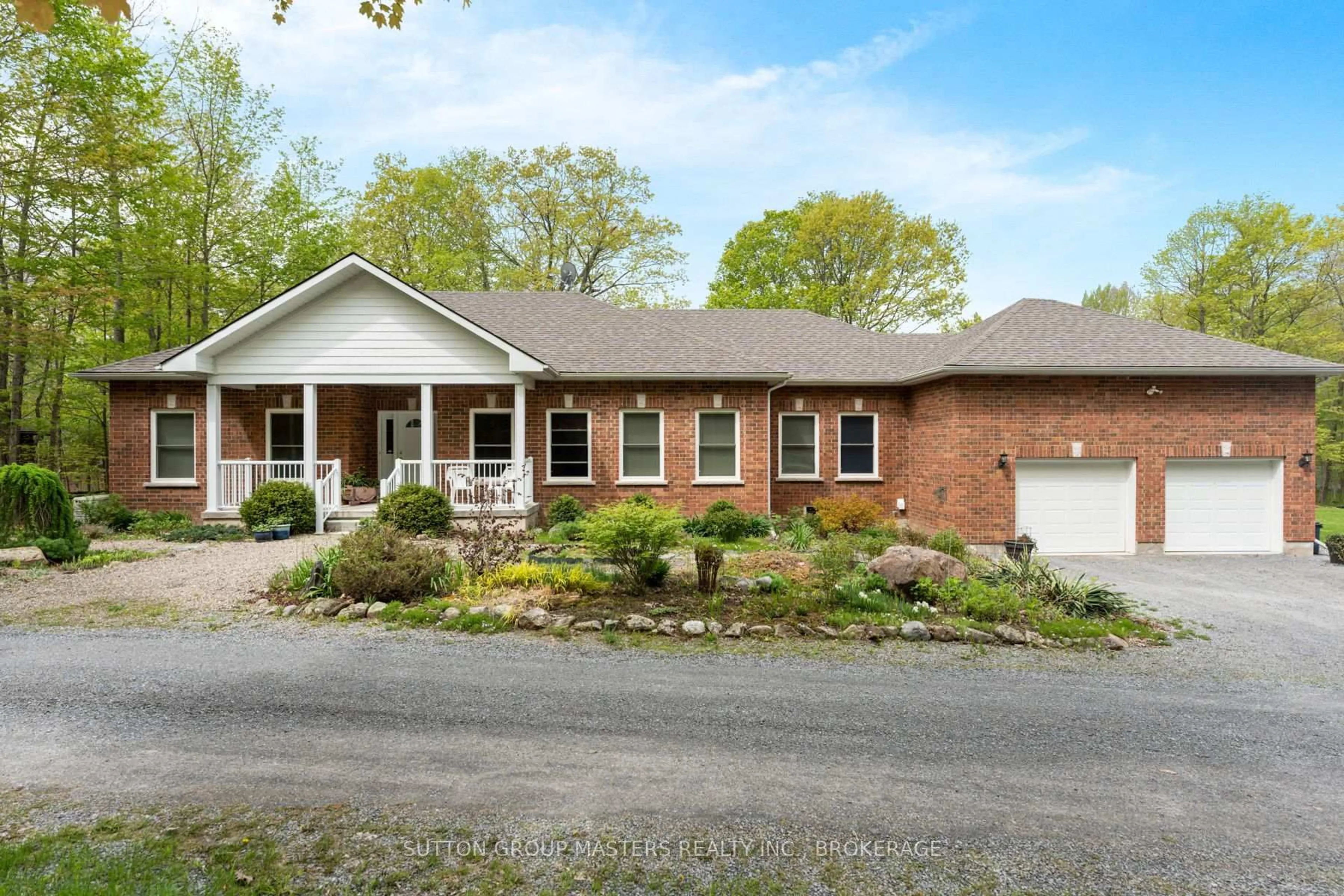 Home with brick exterior material, street for 1023 Big Ben Lane, Sydenham Ontario K0H 2T0