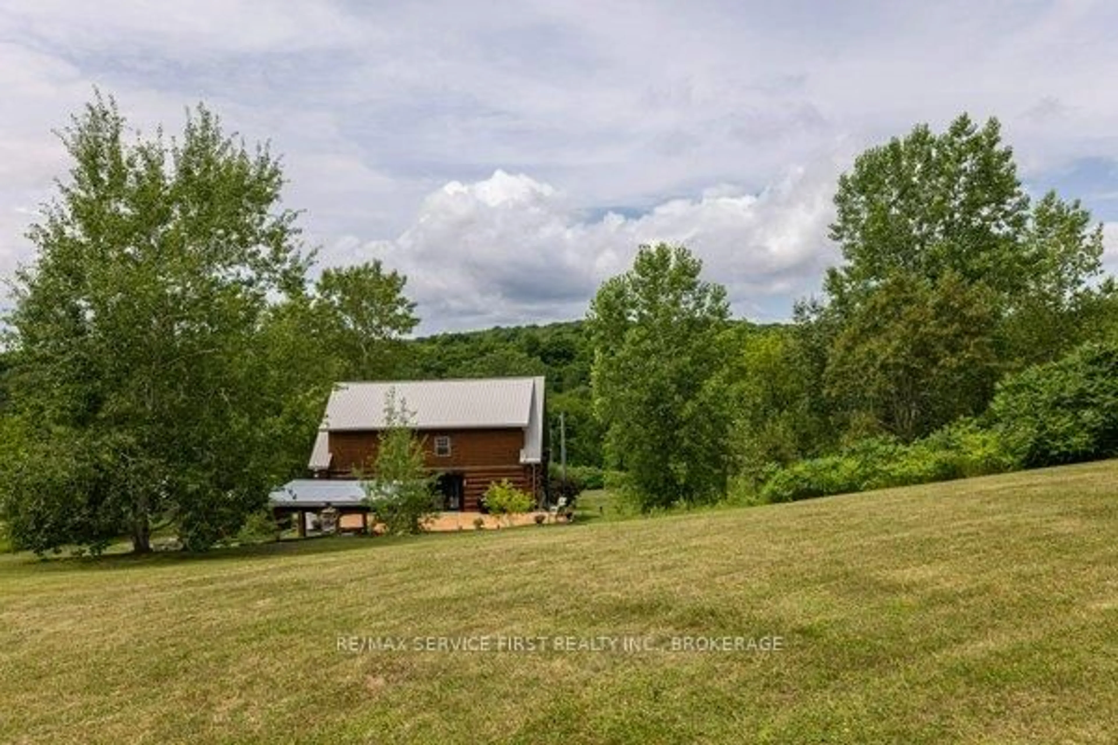 A pic from outside/outdoor area/front of a property/back of a property/a pic from drone, unknown for 4668 Portland Loughborough Boundary Road Rd, Harrowsmith Ontario K0H 1V0