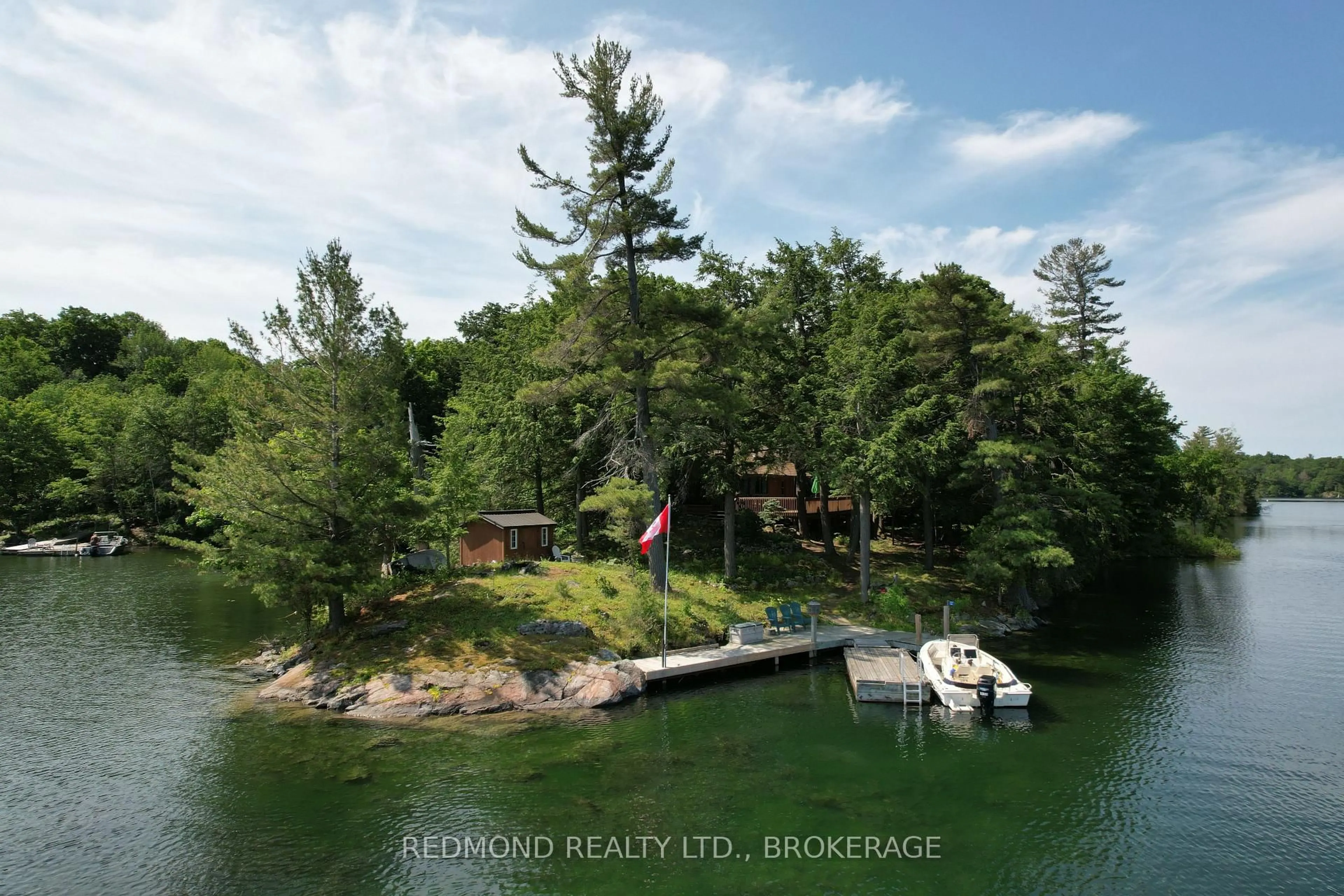 A pic from outside/outdoor area/front of a property/back of a property/a pic from drone, water/lake/river/ocean view for 32 Downie Island, Front of Leeds & Seeleys Bay Ontario K0E 1L0