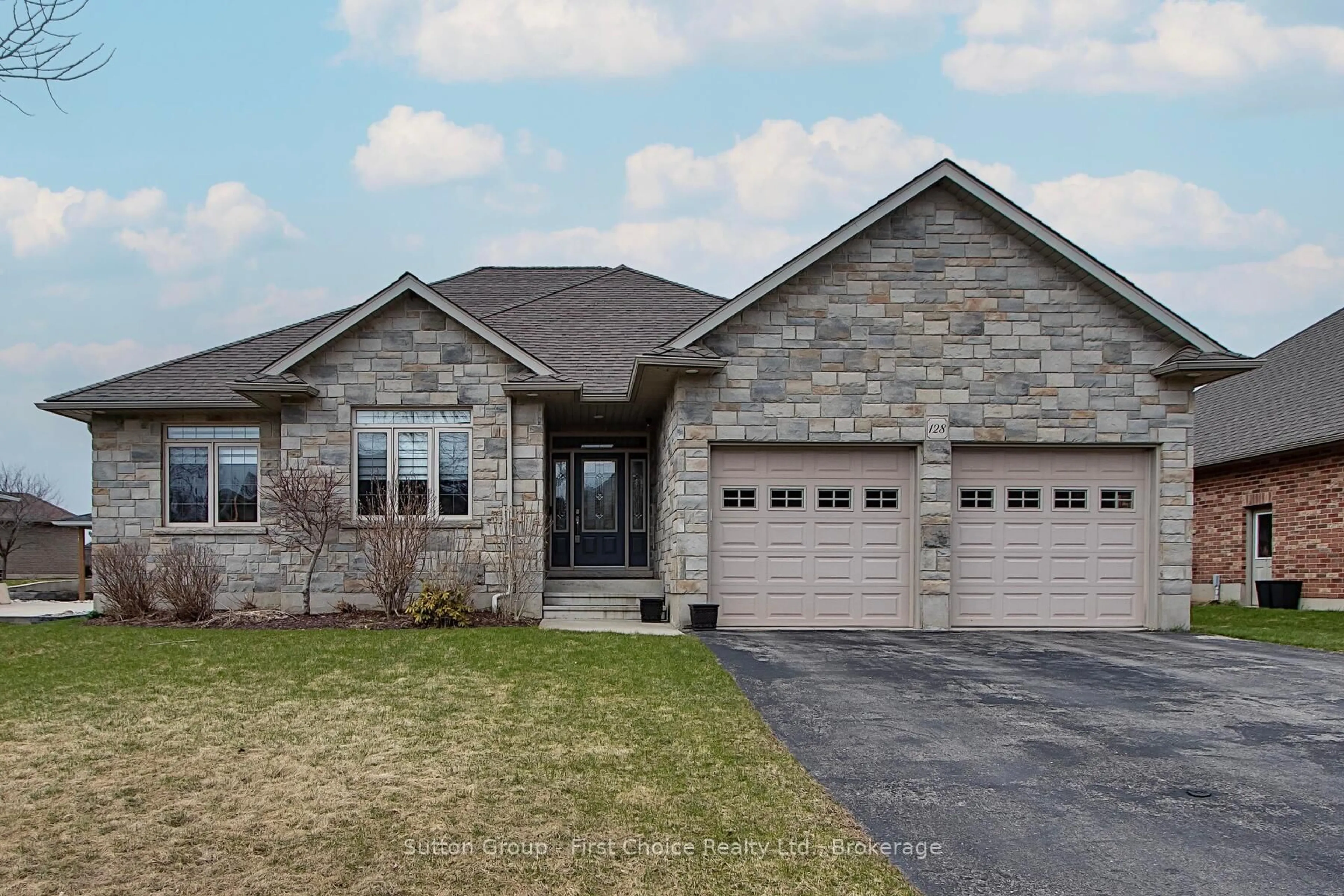 Home with brick exterior material, street for 128 Sir Adam Beck Rd, Stratford Ontario N5A 8C2
