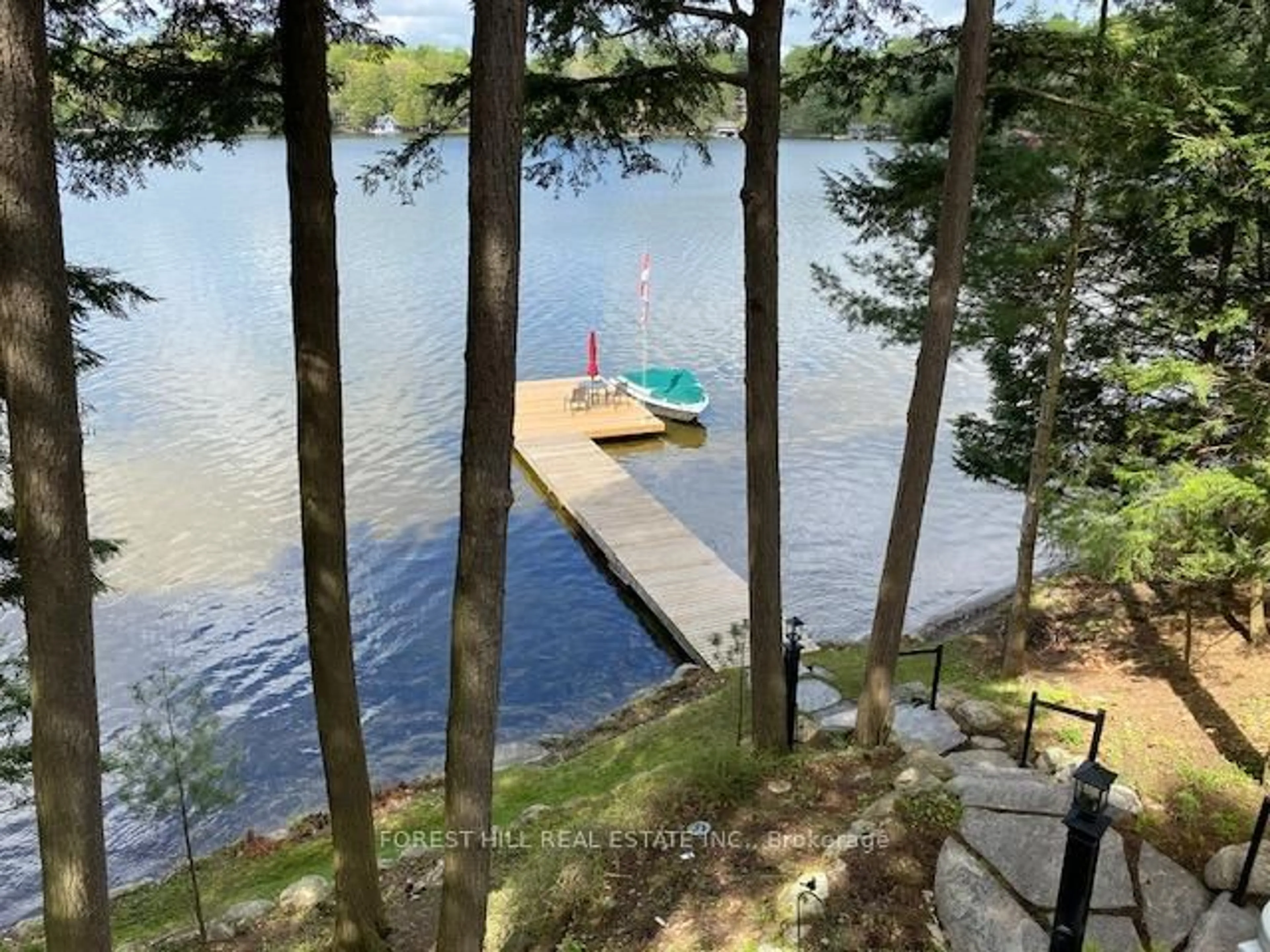A pic from outside/outdoor area/front of a property/back of a property/a pic from drone, water/lake/river/ocean view for 1116 Sagamo Blvd, Muskoka Lakes Ontario P0B 1J0