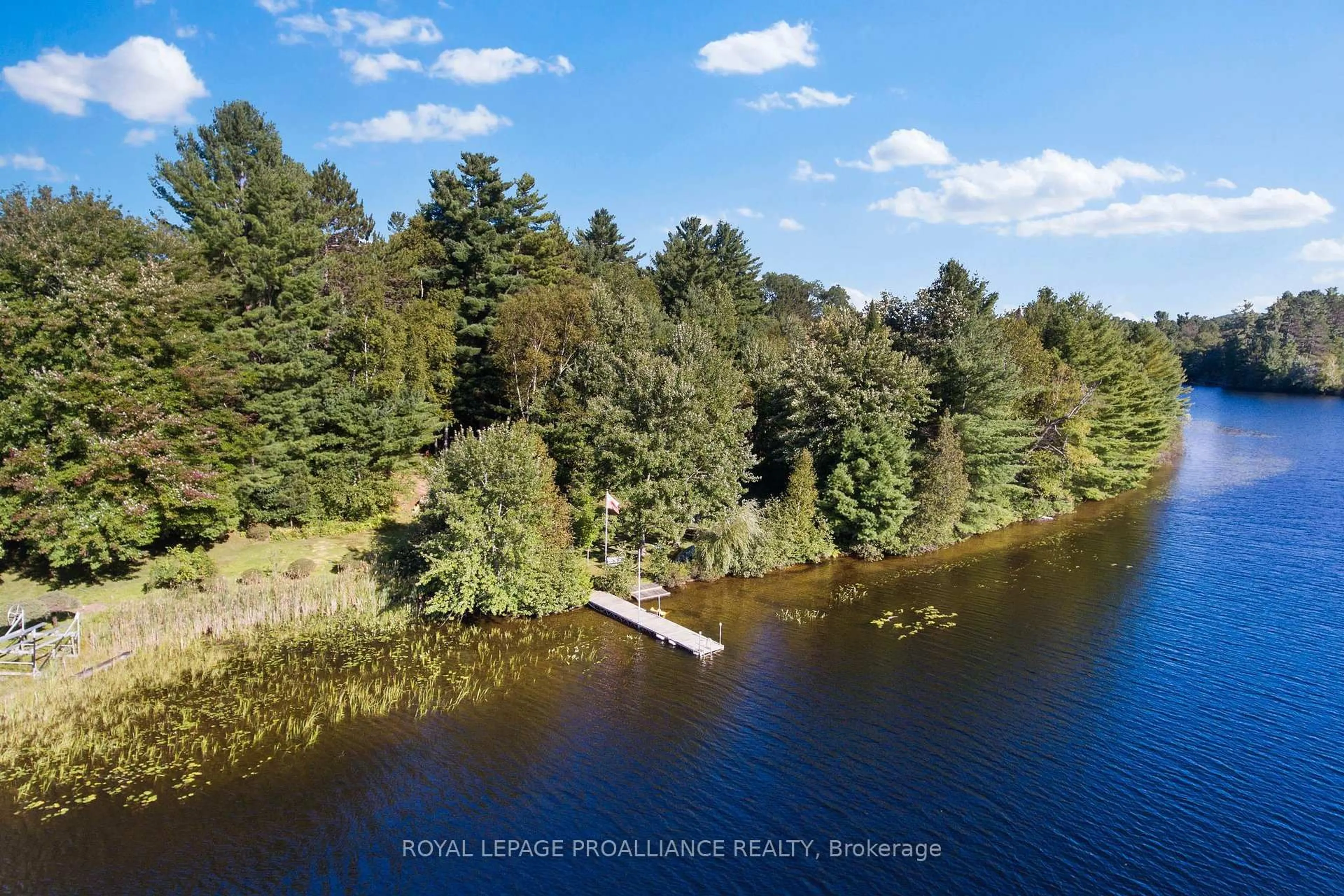 A pic from outside/outdoor area/front of a property/back of a property/a pic from drone, water/lake/river/ocean view for 25B Cormorant Lane, Combermere Ontario K0J 1L0