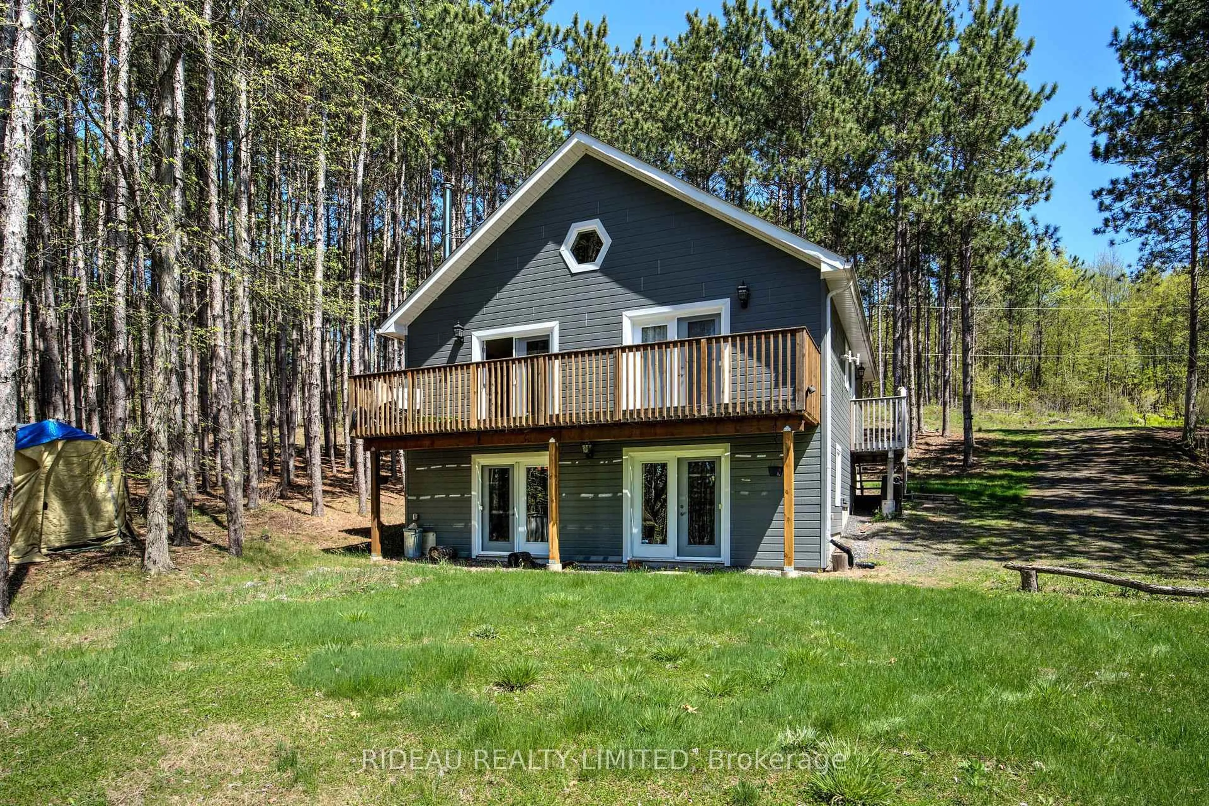 A pic from outside/outdoor area/front of a property/back of a property/a pic from drone, water/lake/river/ocean view for 63 Duck Bay Lane, Rideau Lakes Ontario K0G 1V0